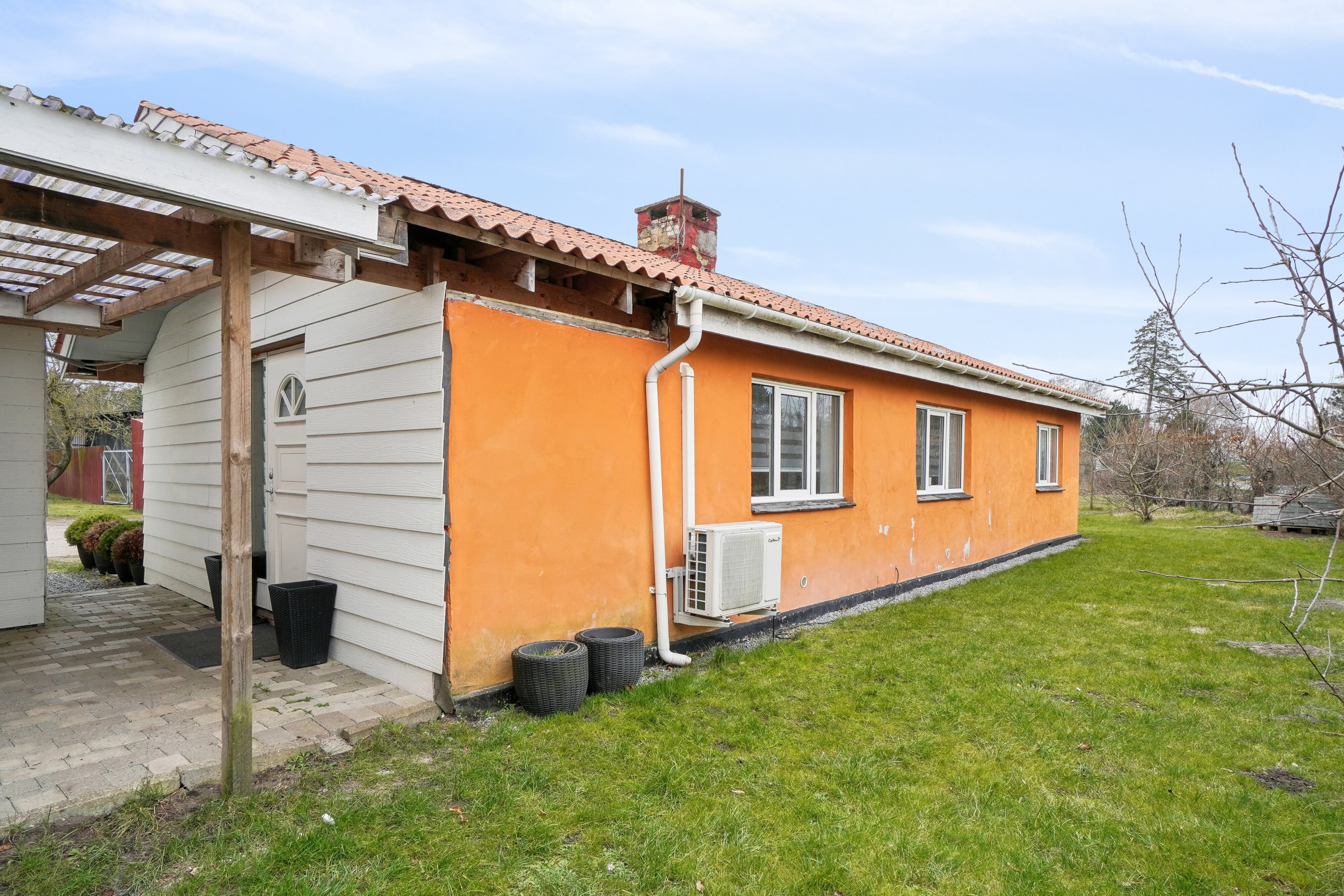 Fremhævet set fra haven billede i fuldskærmstilstand. Billede af Trælastvej 10, Audebo, 4300 Holbæk