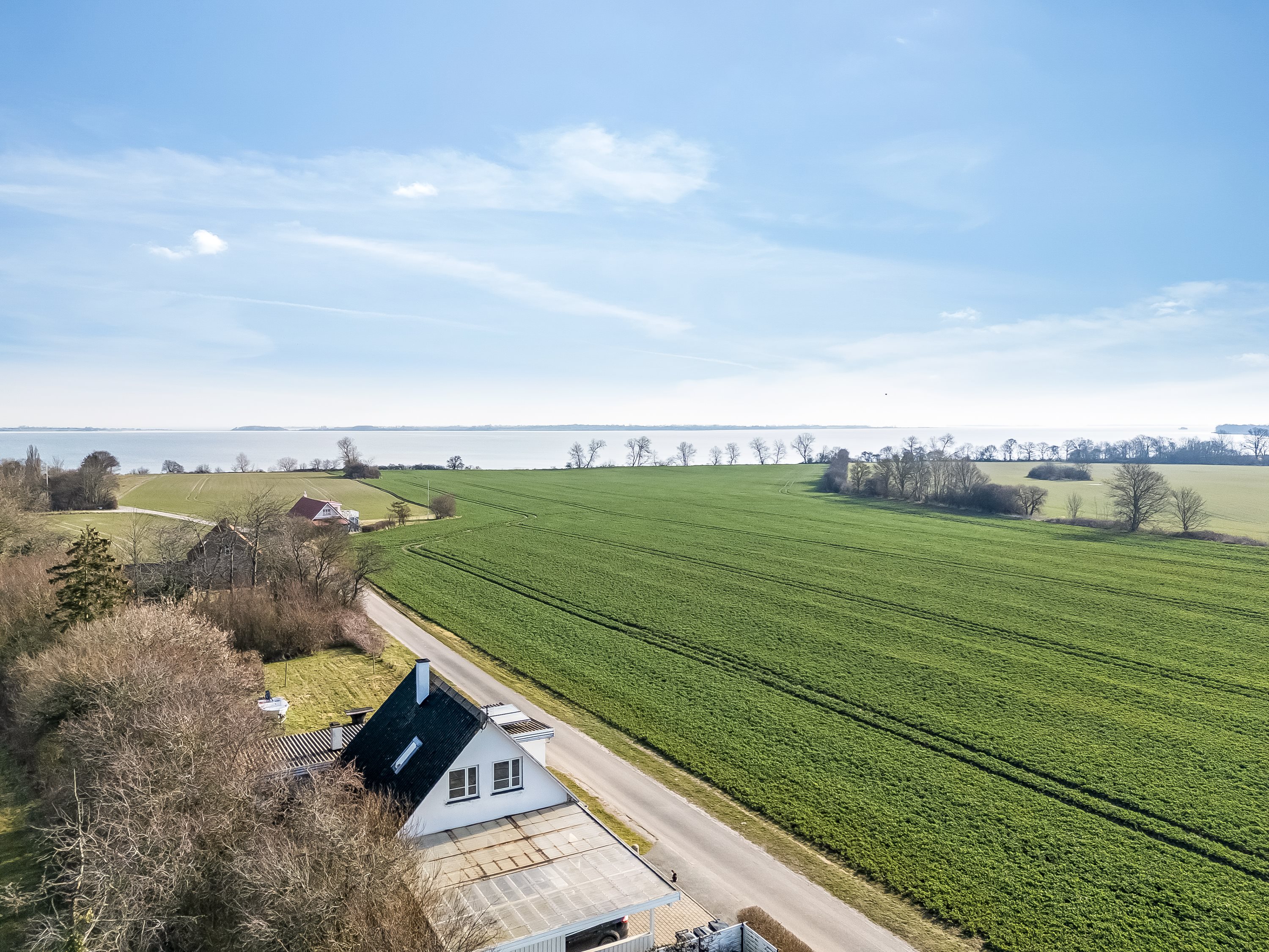 Fremhævet luftfoto billede i fuldskærmstilstand. Billede af Egholm Strandvej 13, 4913 Horslunde