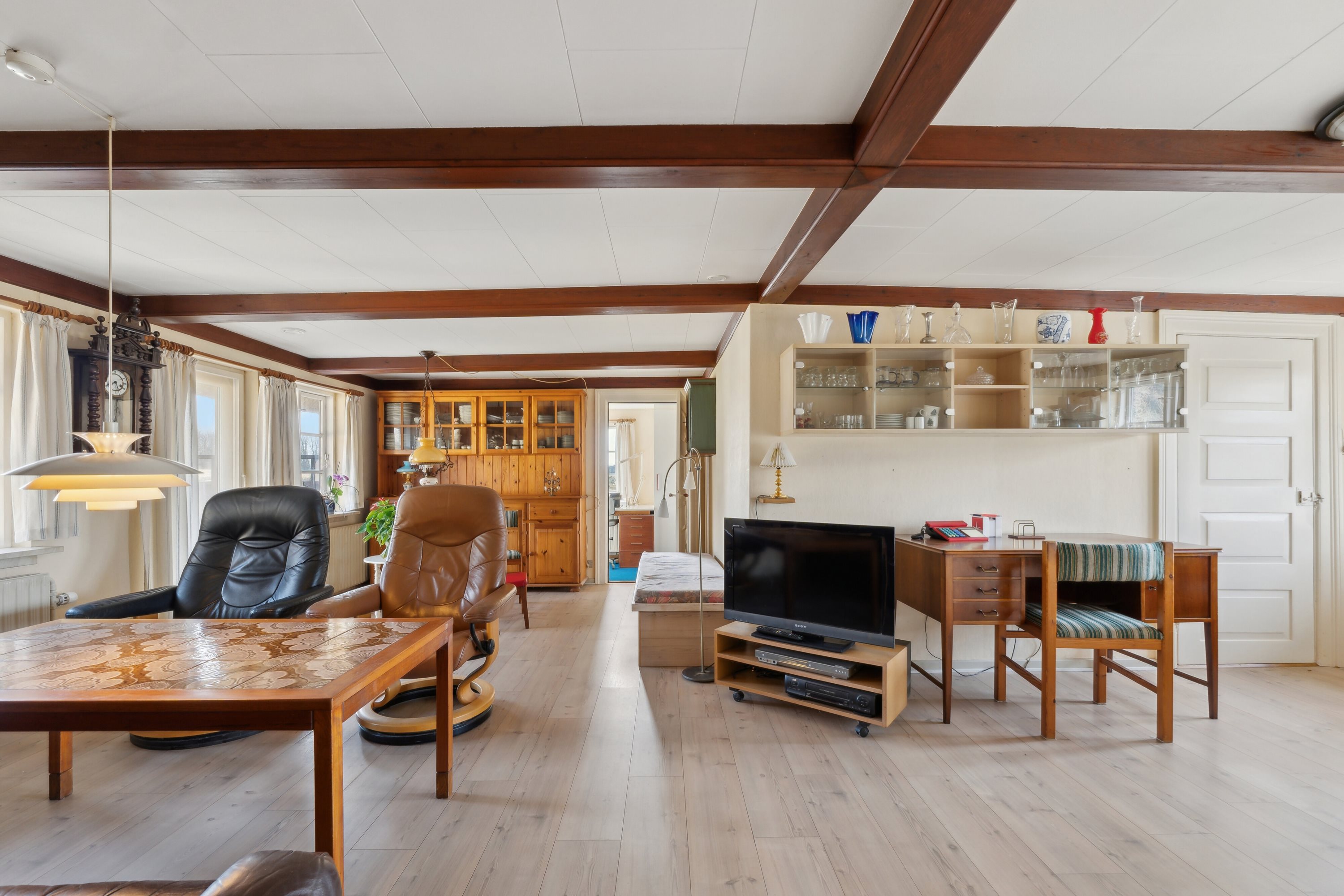 Fremhævet stue billede i fuldskærmstilstand. Billede af Brændeskovvej 18, Tved, 5700 Svendborg