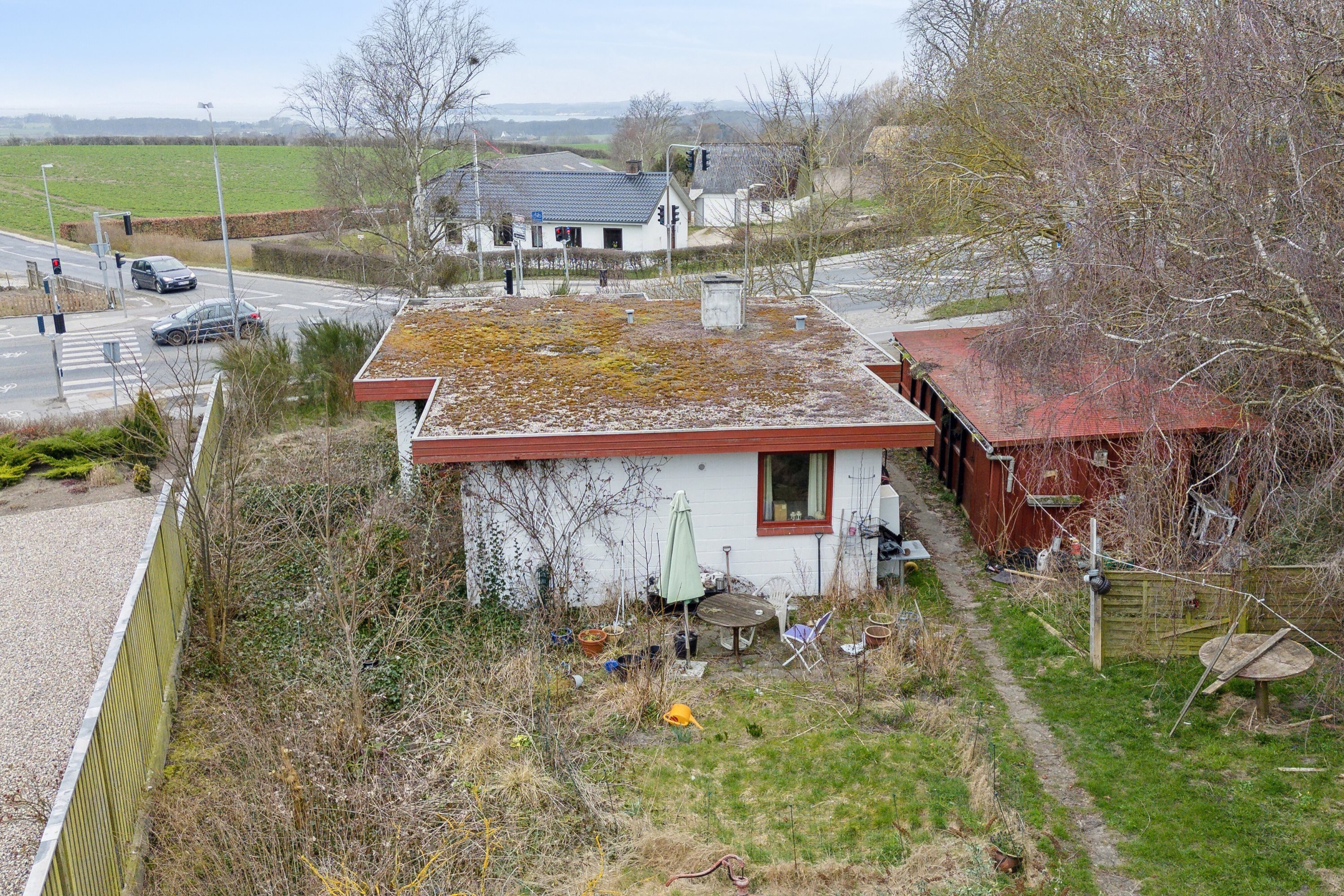 Fremhævet set fra haven billede i fuldskærmstilstand. Billede af Sundbrovej 51, 5700 Svendborg