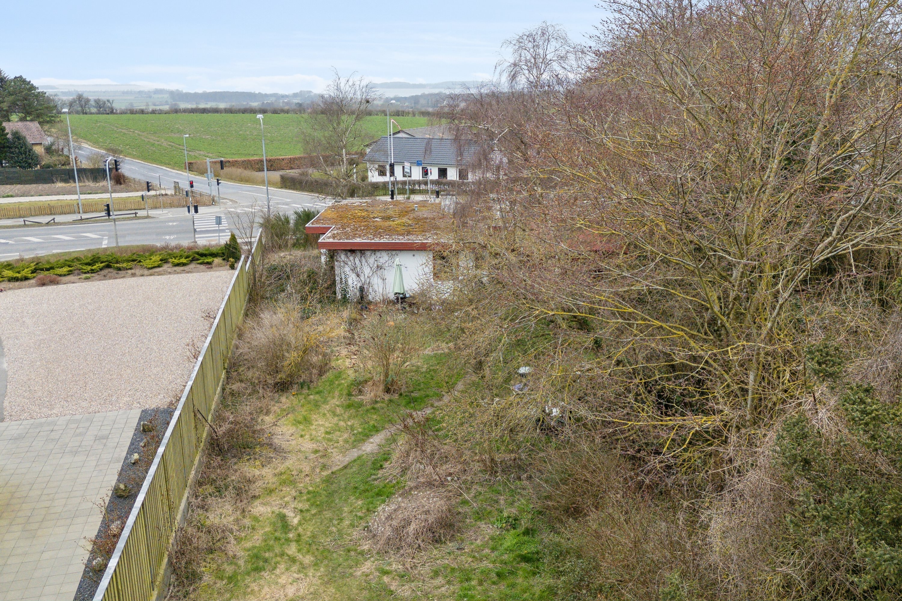 Fremhævet set fra haven billede i fuldskærmstilstand. Billede af Sundbrovej 51, 5700 Svendborg