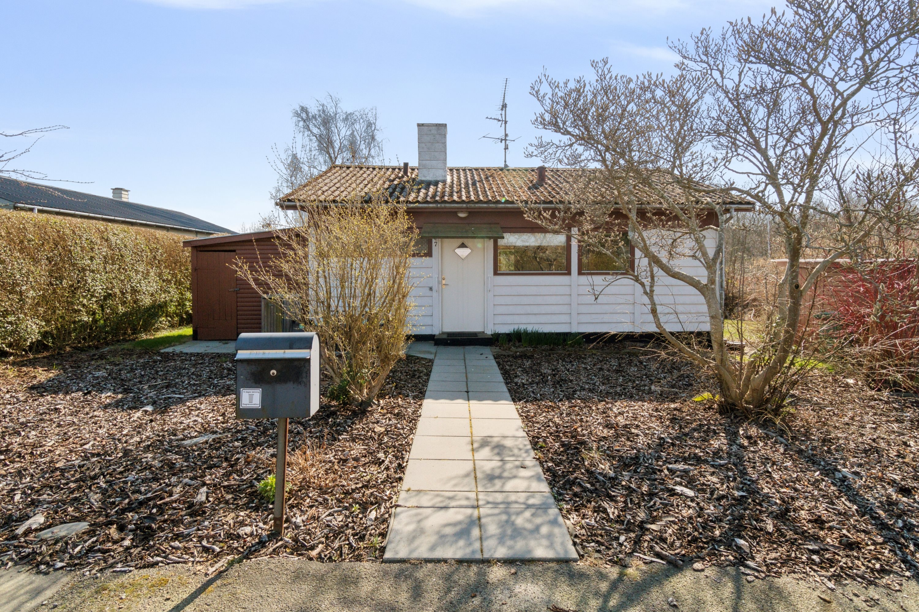 Fremhævet udendørs billede i fuldskærmstilstand. Billede af Buen 7, Lobbæk, 3720 Aakirkeby