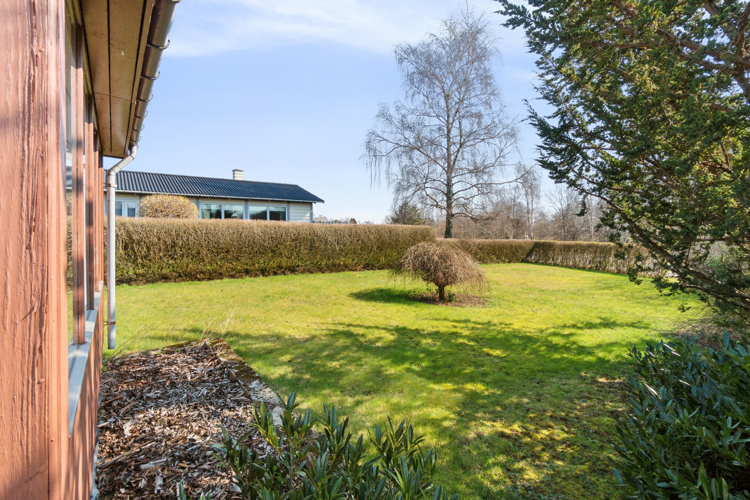 Fremhævet udendørs billede i fuldskærmstilstand. Billede af Buen 7, Lobbæk, 3720 Aakirkeby