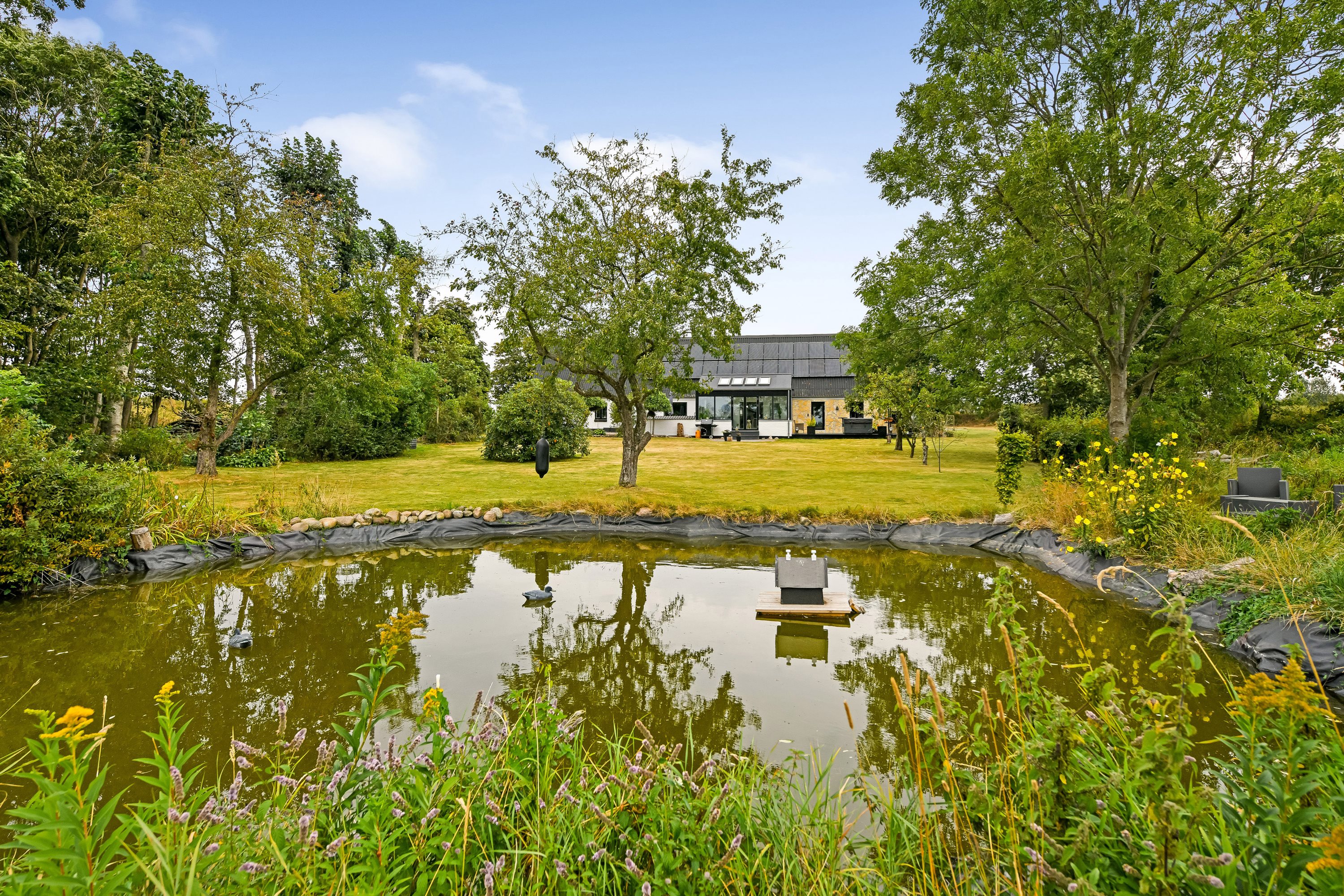 Fremhævet have billede i fuldskærmstilstand. Billede af Astrupvej 50, 6715 Esbjerg N