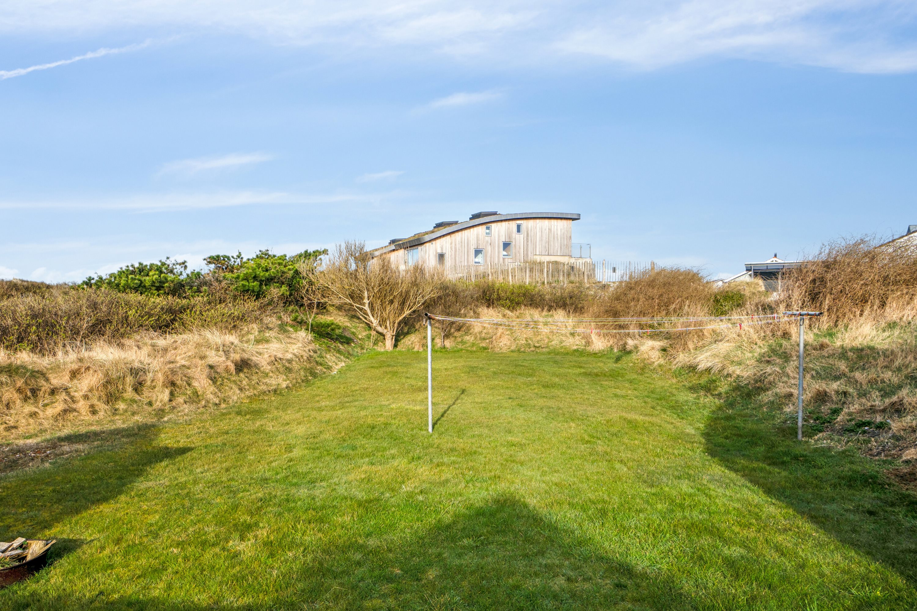 Fremhævet set fra haven billede i fuldskærmstilstand. Billede af Knottivej 3, Vorupør, 7700 Thisted