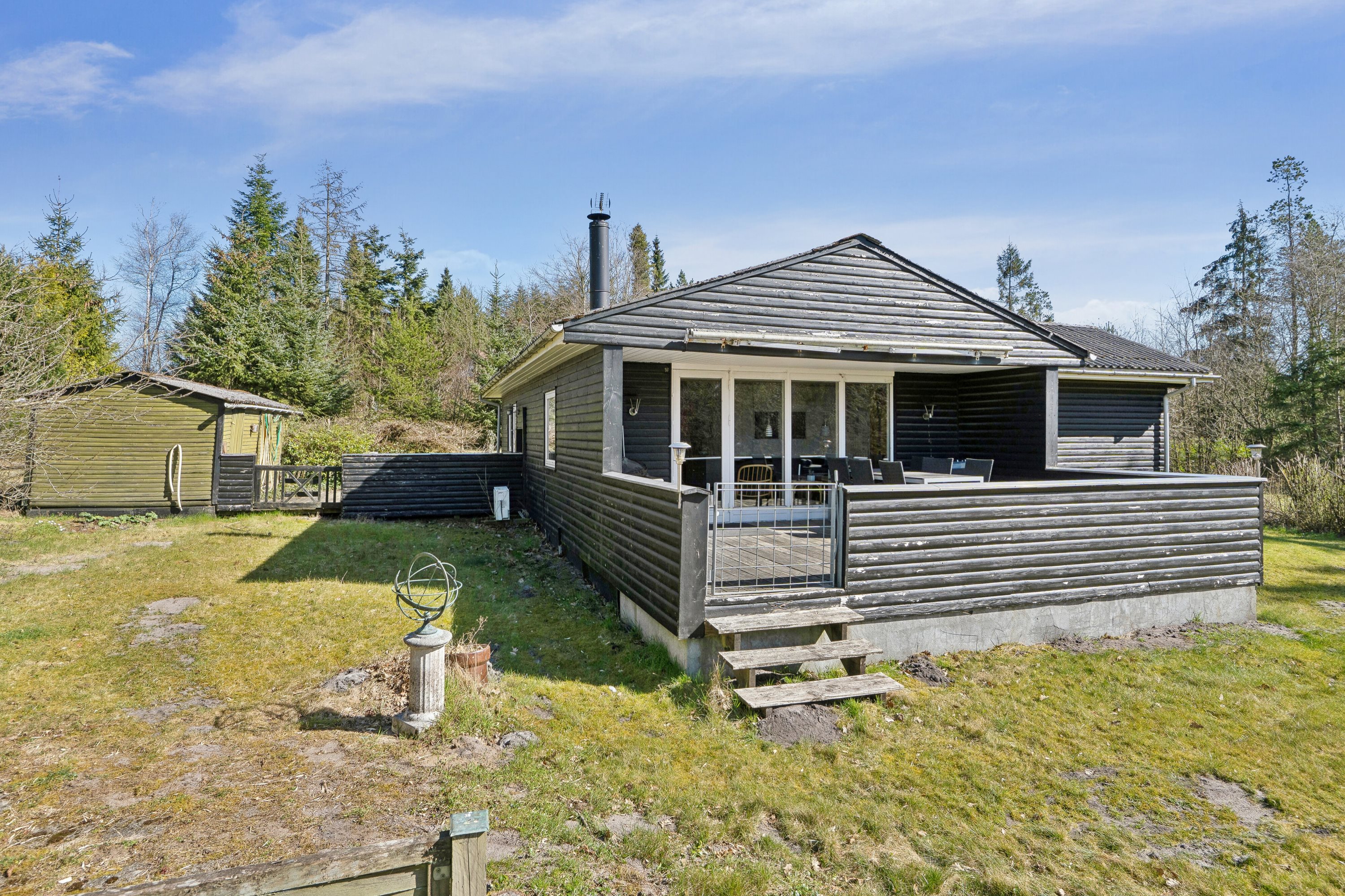 Fremhævet set fra haven billede i fuldskærmstilstand. Billede af Tyttebærvej 48, 7441 Bording