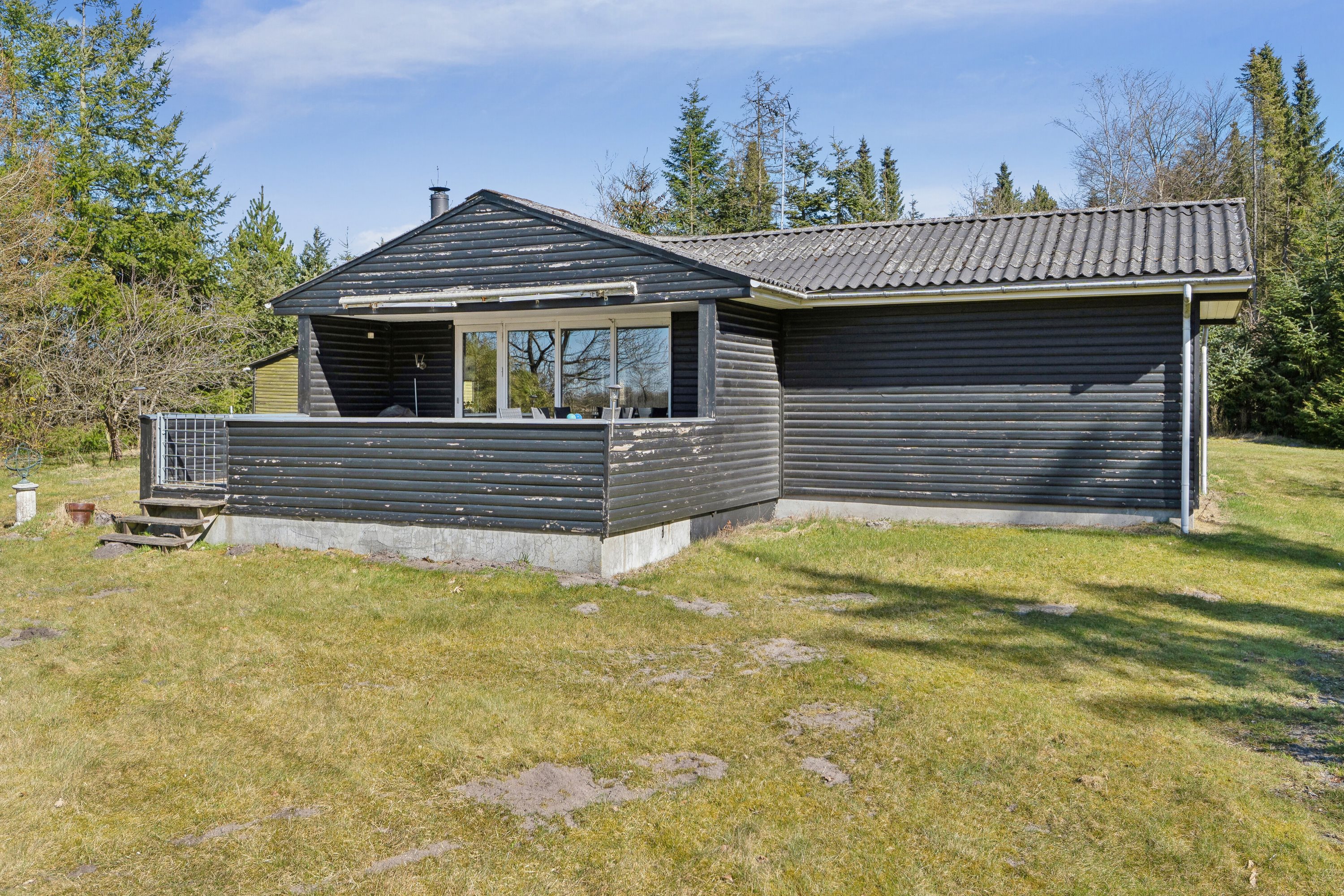 Fremhævet set fra haven billede i fuldskærmstilstand. Billede af Tyttebærvej 48, 7441 Bording