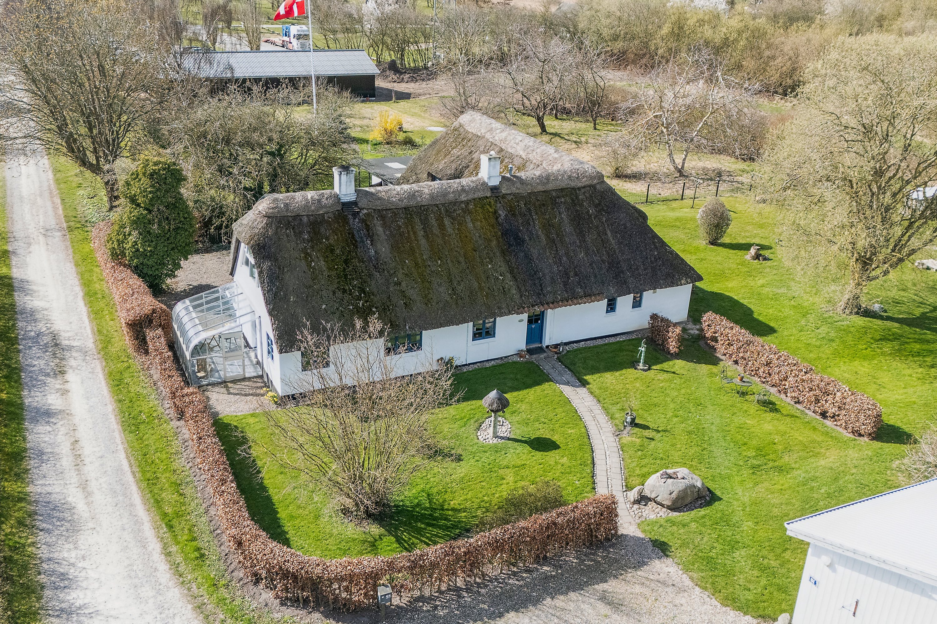 Fremhævet luftfoto billede i fuldskærmstilstand. Billede af Østerskovvej 51, Østerskov, 5932 Humble