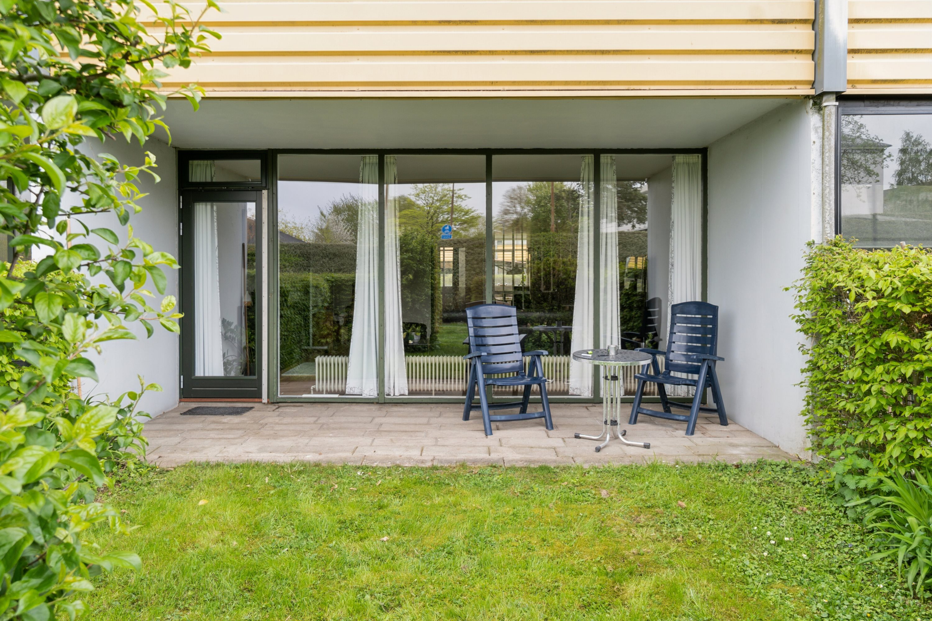 Fremhævet set fra haven billede i fuldskærmstilstand. Billede af Byskov Alle 16, st.. tv., 4200 Slagelse