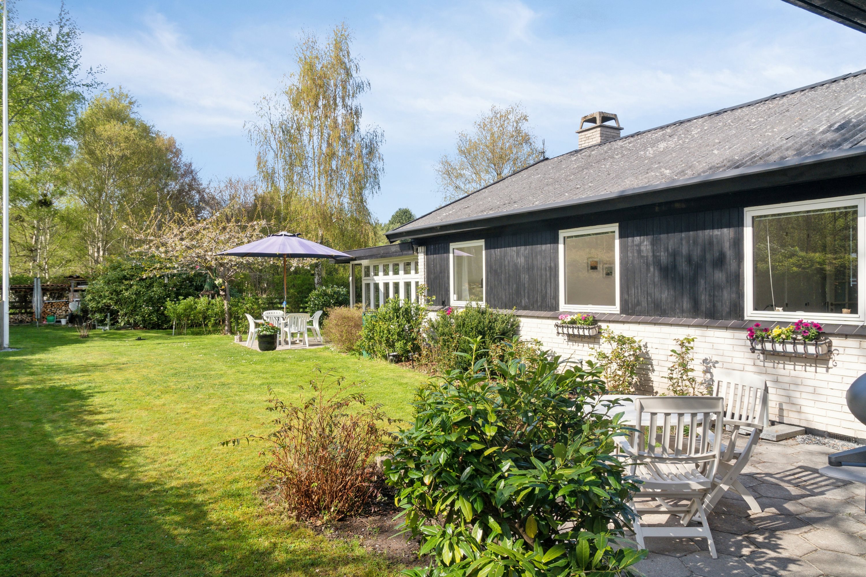 Fremhævet set fra haven billede i fuldskærmstilstand. Billede af Rørvigvej 149, 4500 Nykøbing Sj