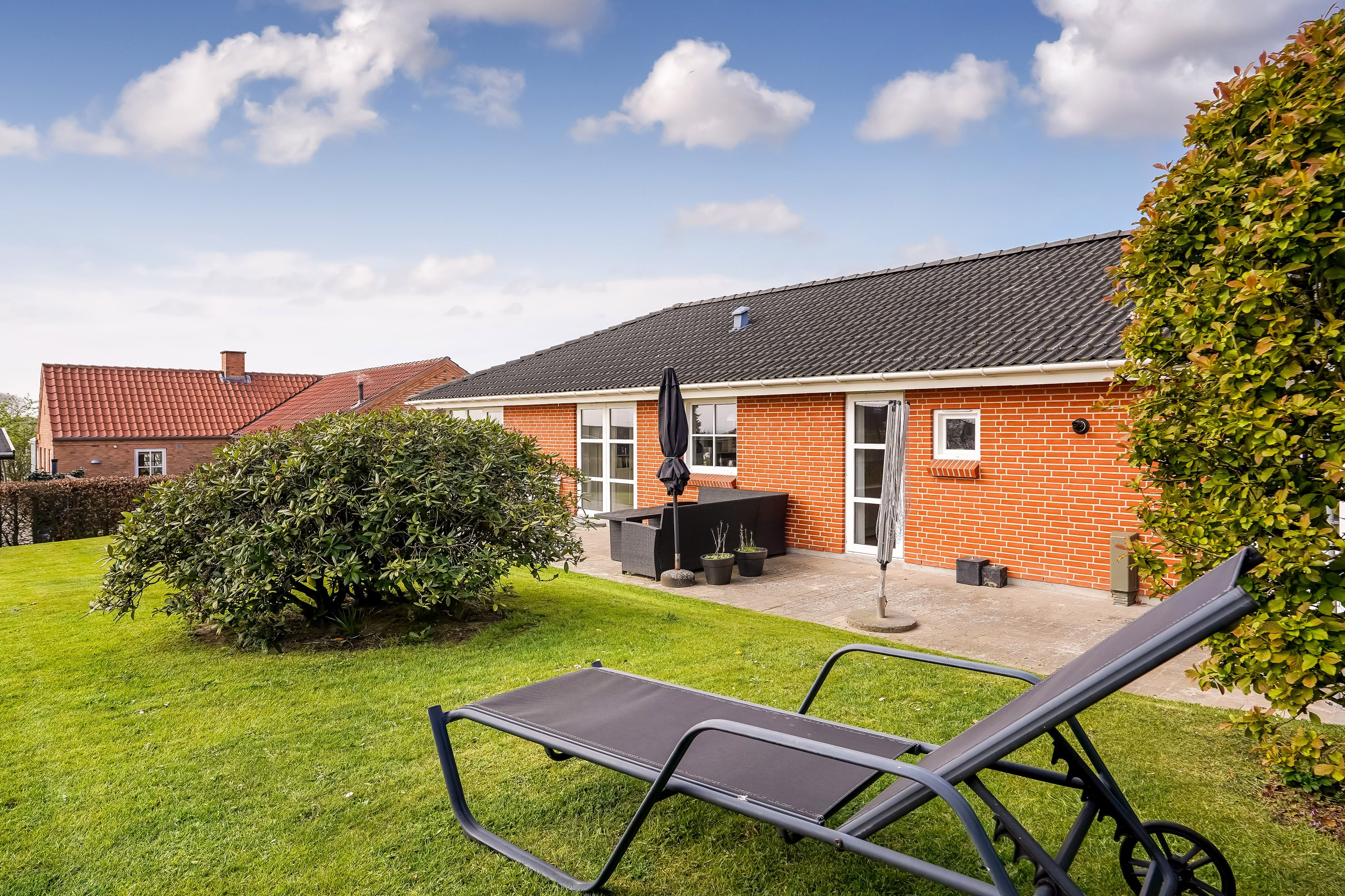 Fremhævet terrasse billede i fuldskærmstilstand. Billede af Lyøvej 10, Baaring, 5466 Asperup