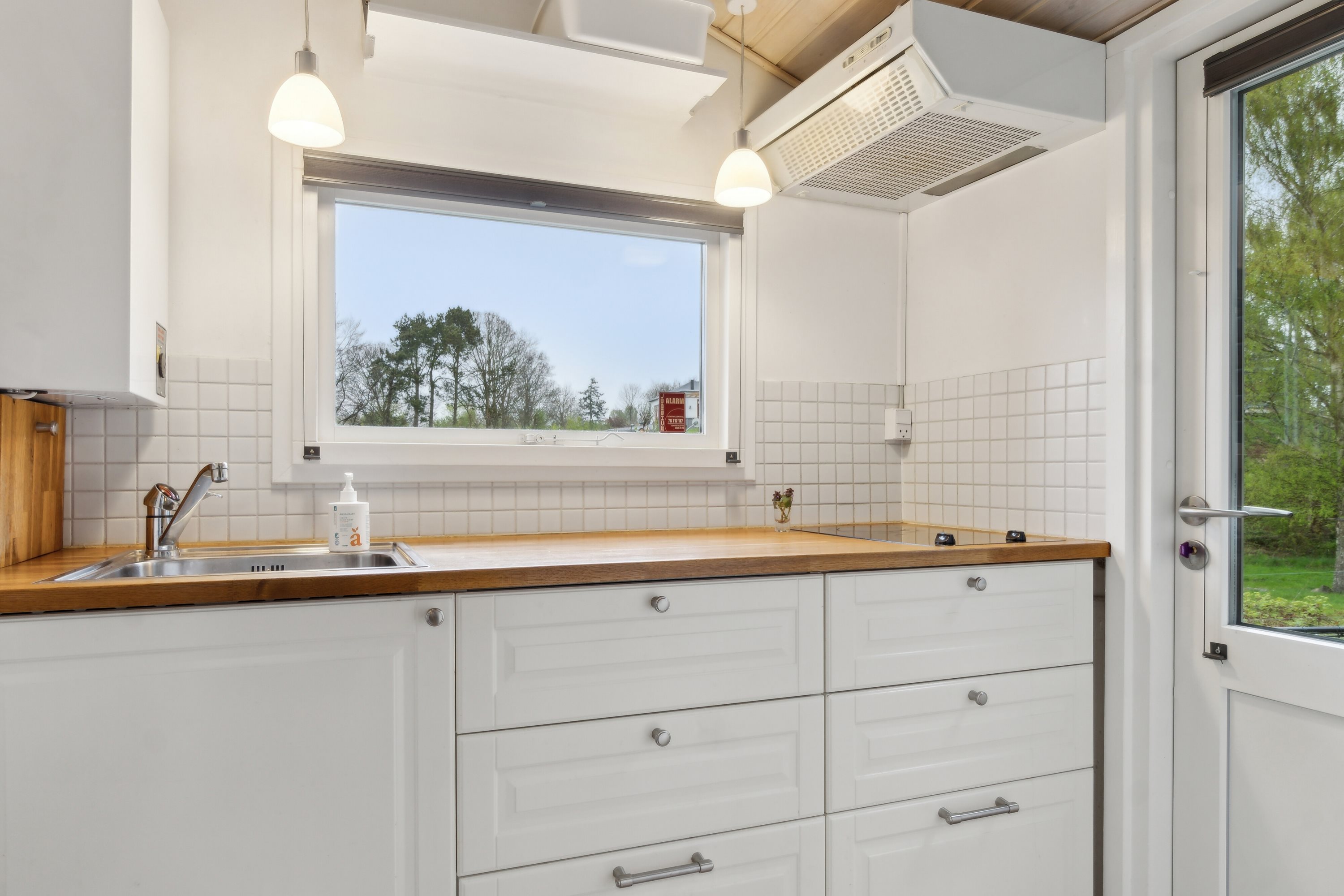 Fremhævet køkken billede i fuldskærmstilstand. Billede af C.A. Nielsensvej 31, Ølsted Strandhuse, 3310 Ølsted