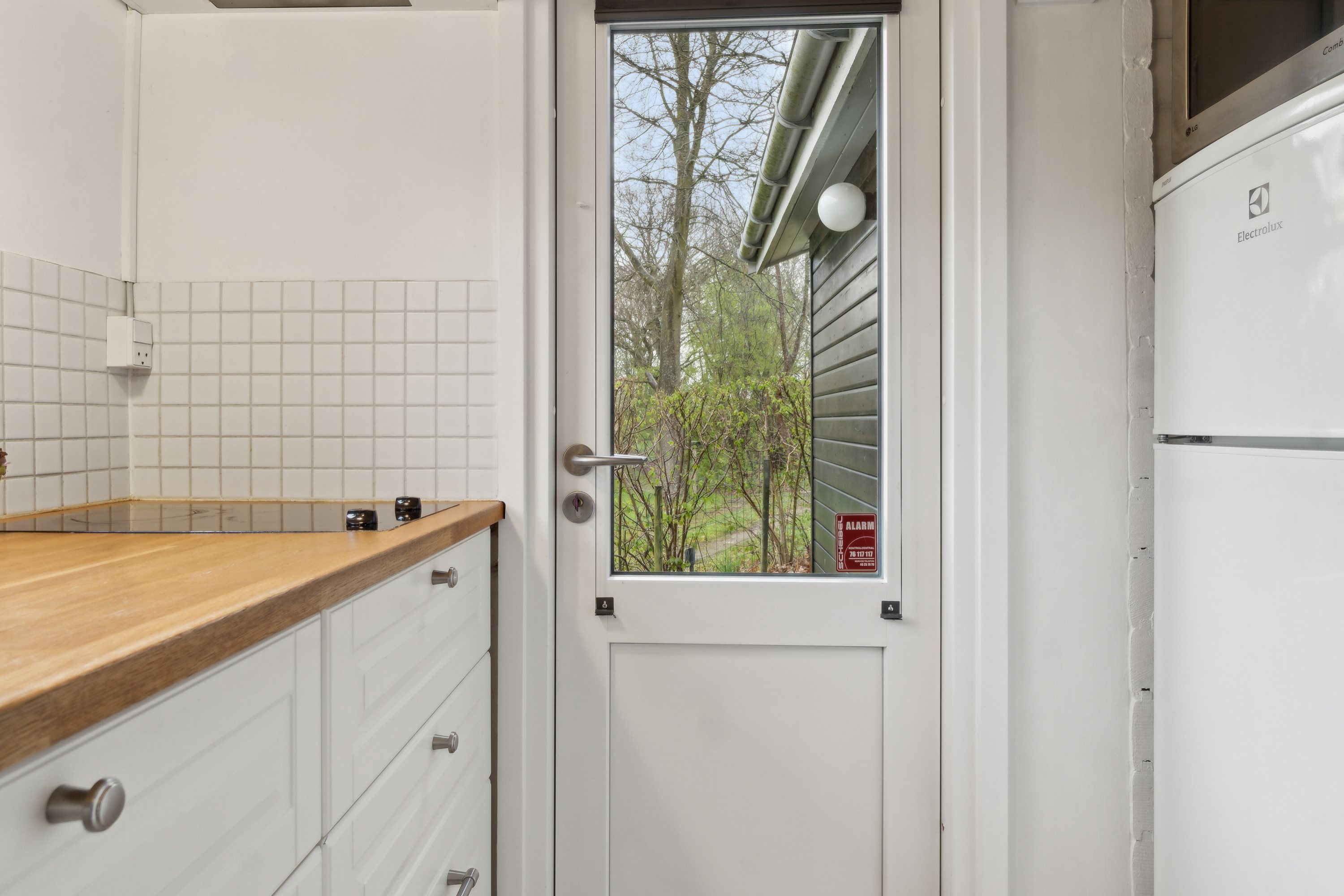 Fremhævet køkken billede i fuldskærmstilstand. Billede af C.A. Nielsensvej 31, Ølsted Strandhuse, 3310 Ølsted