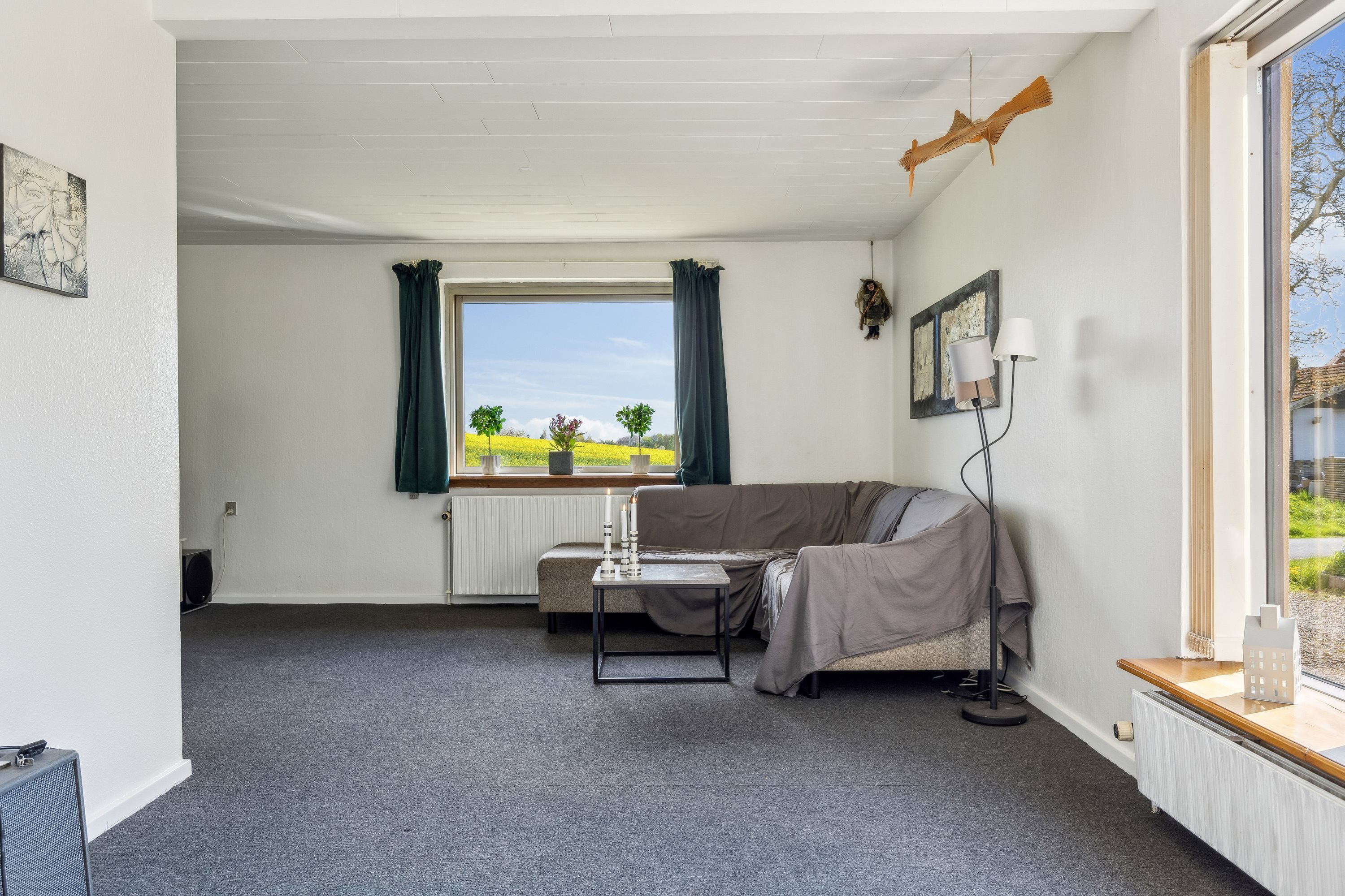 Fremhævet stue billede i fuldskærmstilstand. Billede af Lille Stokkebjergvej 1, 4450 Jyderup