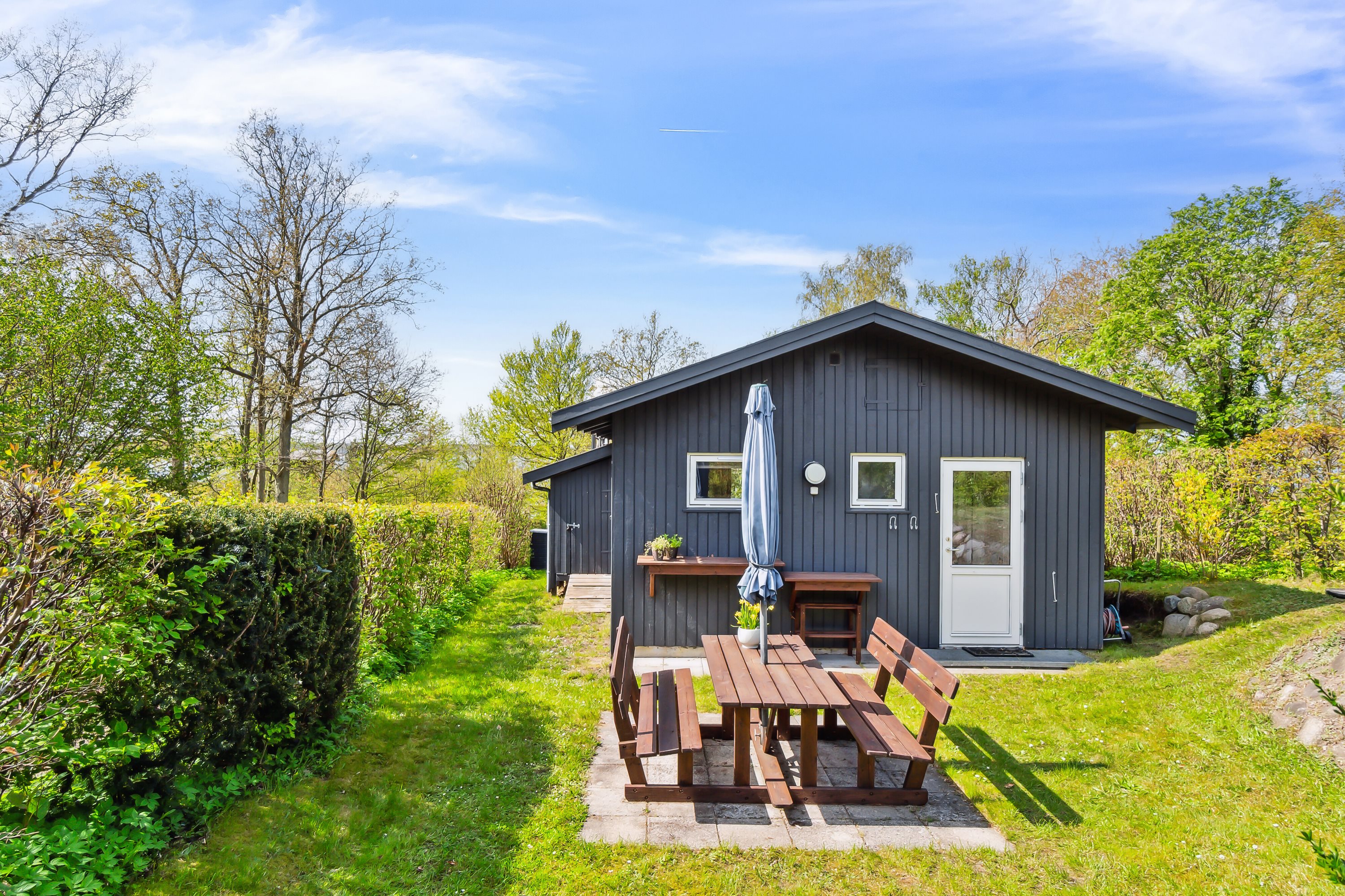 Fremhævet set fra haven billede i fuldskærmstilstand. Billede af C.A. Nielsensvej 33, Ølsted Strandhuse, 3310 Ølsted