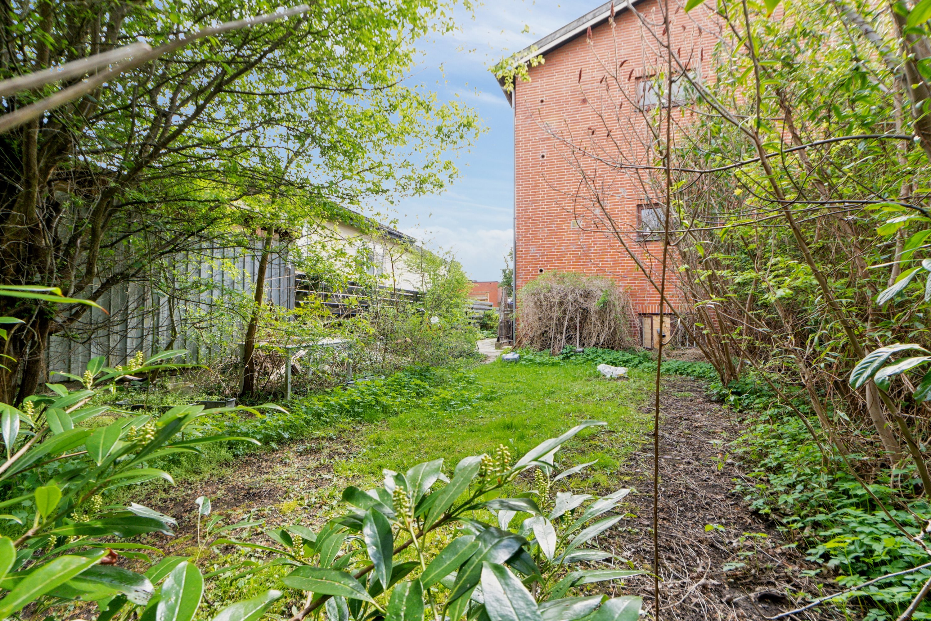 Fremhævet set fra haven billede i fuldskærmstilstand. Billede af Nørregårdsvej 28, 1., 2610 Rødovre