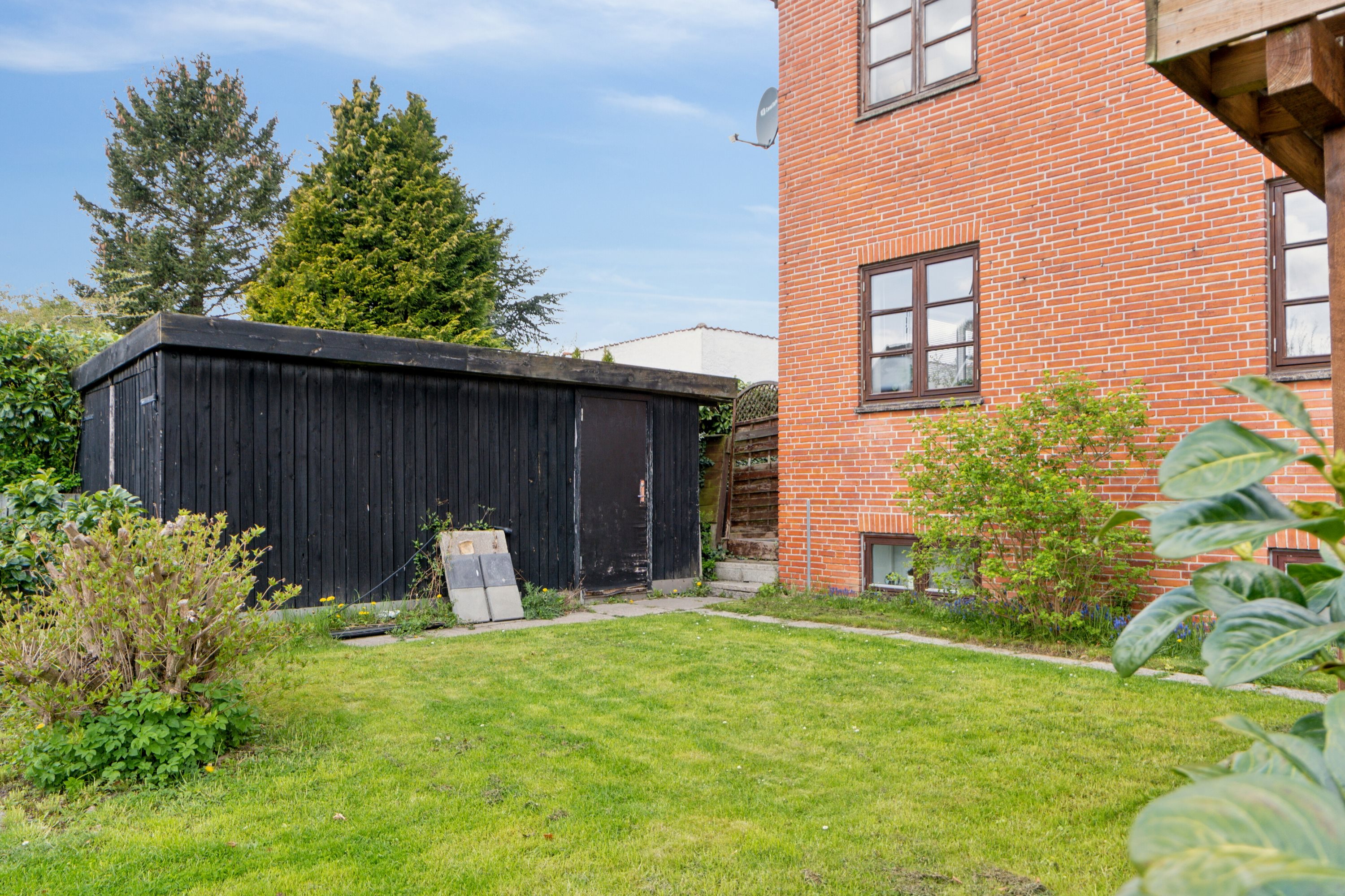 Fremhævet set fra haven billede i fuldskærmstilstand. Billede af Nørregårdsvej 28, 1., 2610 Rødovre