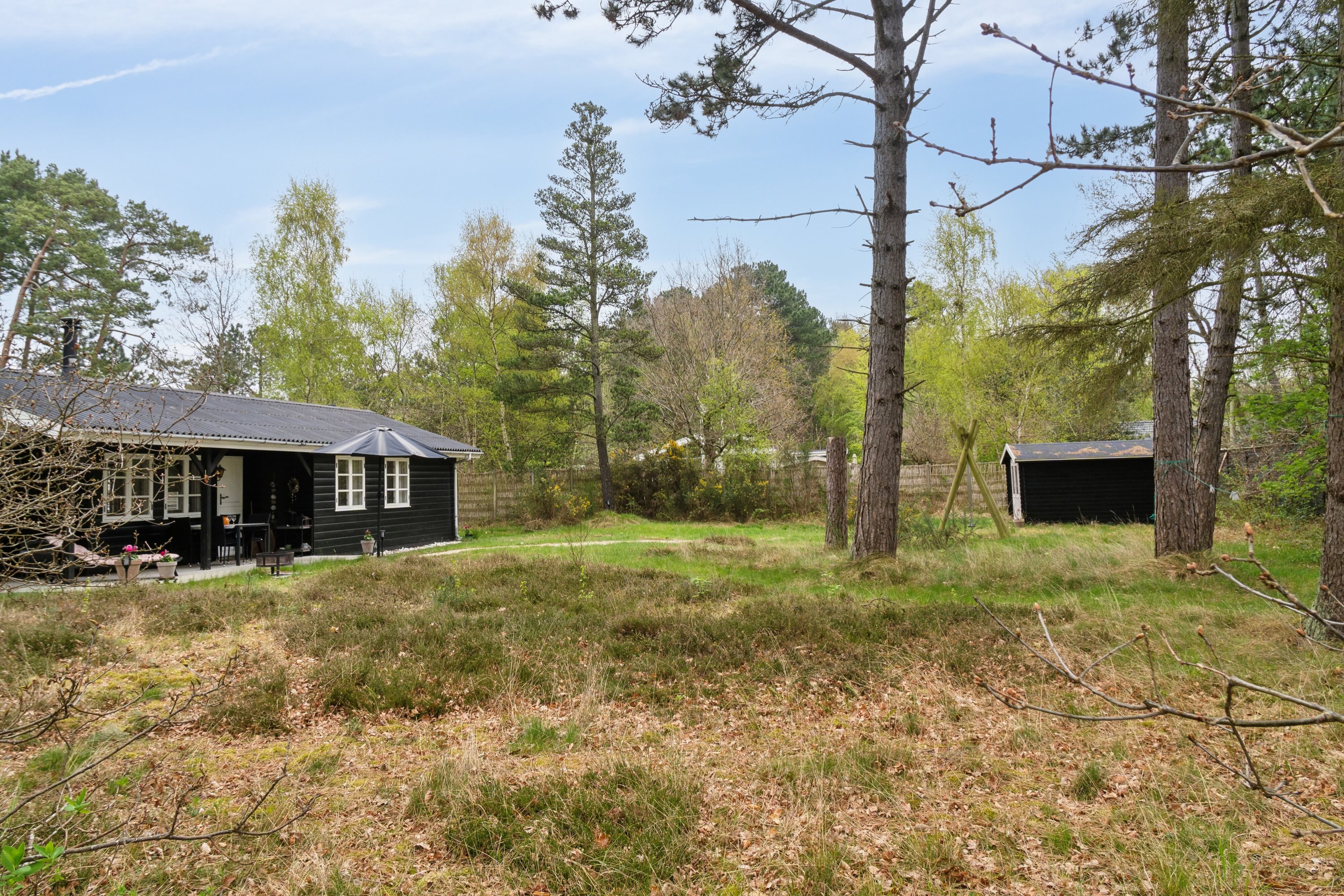 Fremhævet set fra haven billede i fuldskærmstilstand. Billede af Lyngvejen 11, 4500 Nykøbing Sj