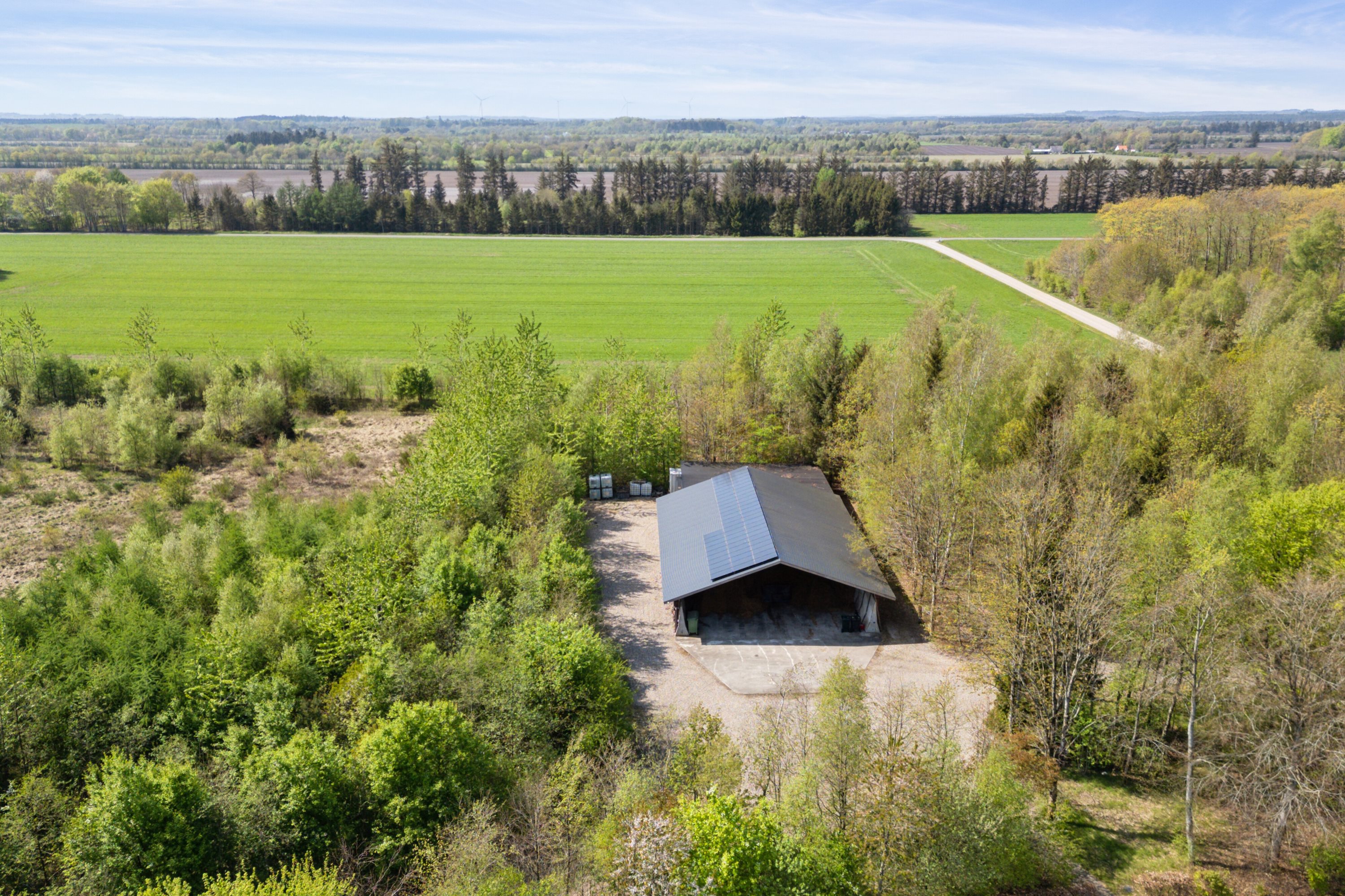 Fremhævet luftfoto billede i fuldskærmstilstand. Billede af Munkhøjvej 4, Lundfod, 7330 Brande