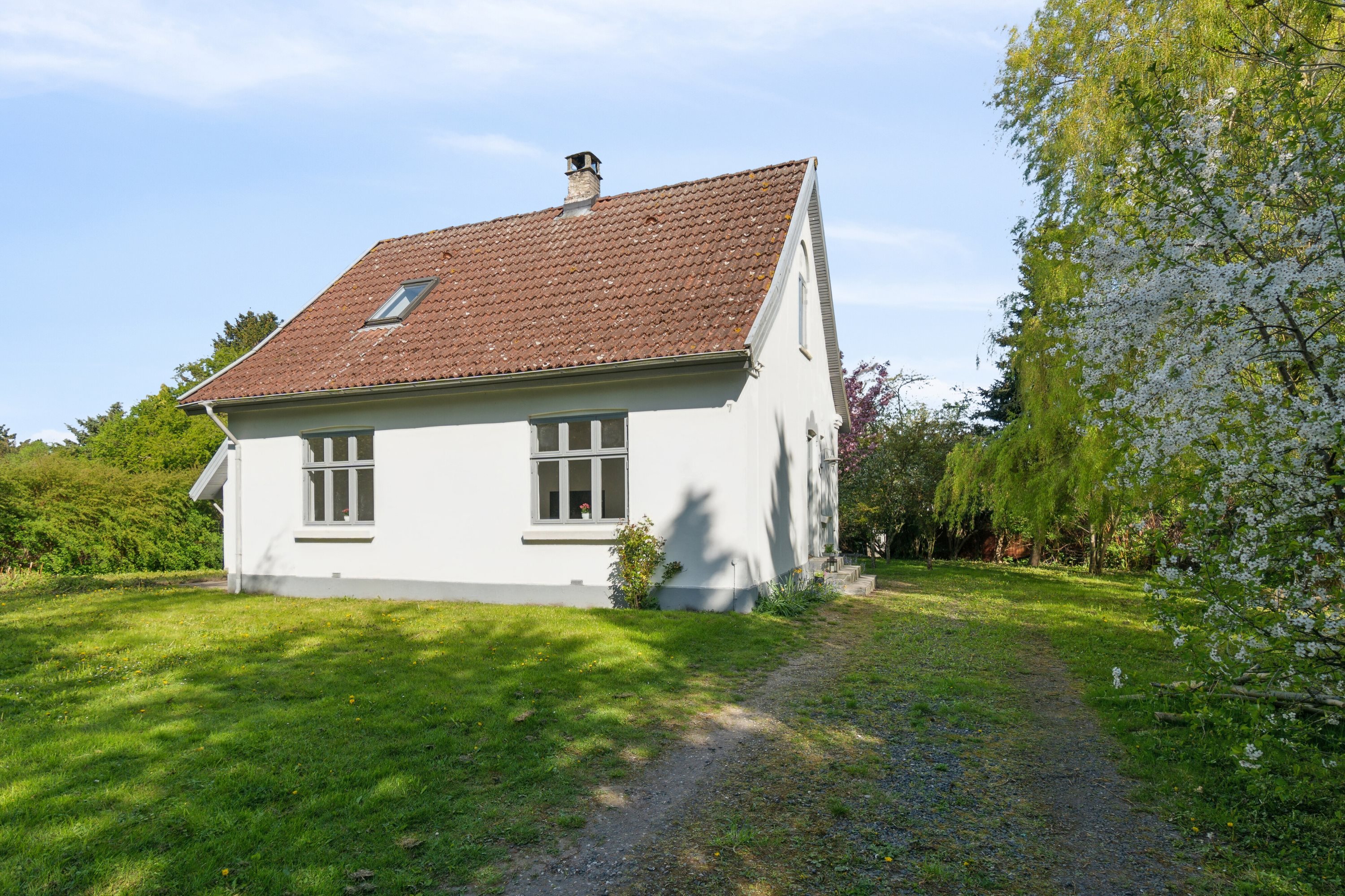 Fremhævet set fra haven billede i fuldskærmstilstand. Billede af Ved Gadekæret 7, Skibinge, 4720 Præstø