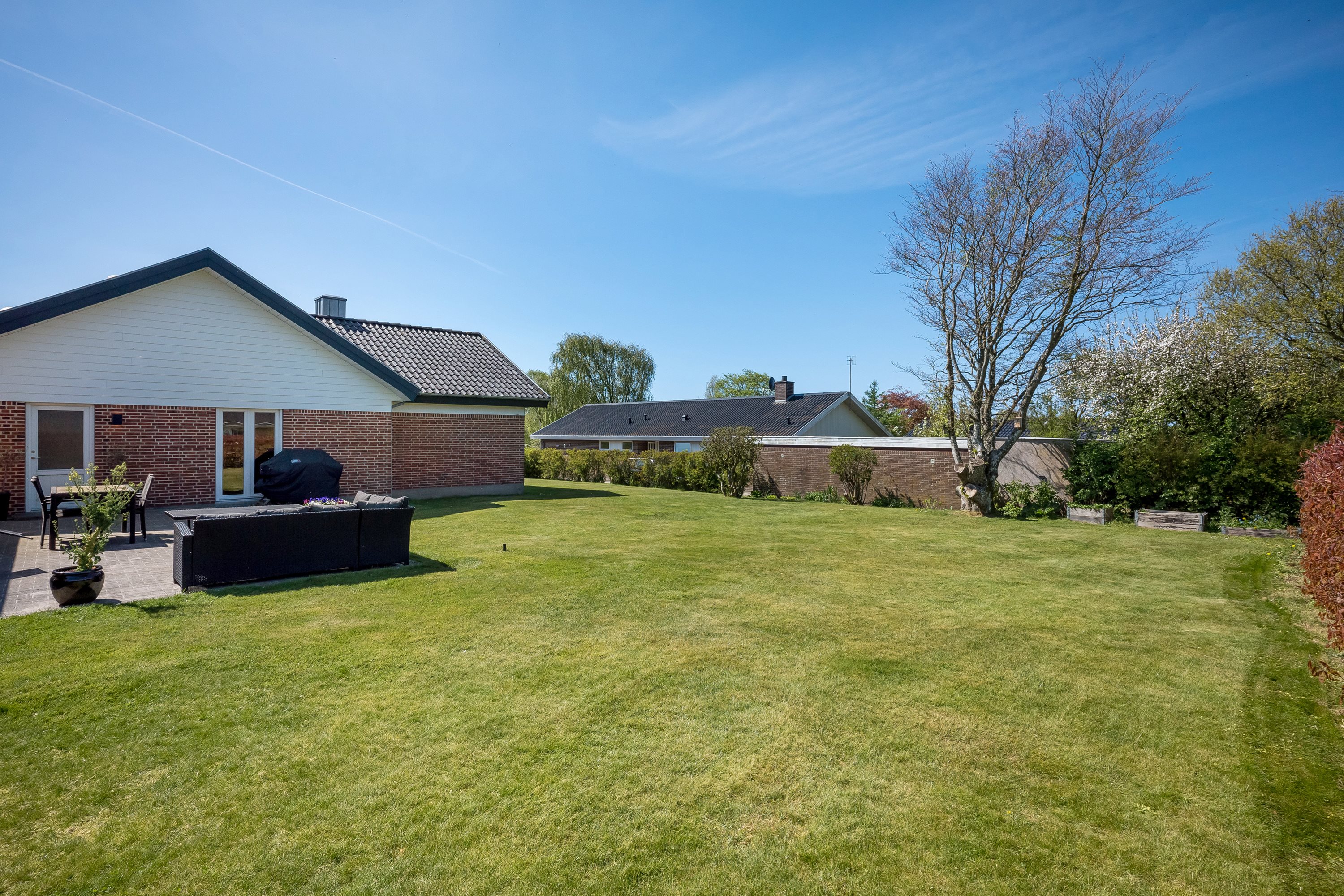 Fremhævet have billede i fuldskærmstilstand. Billede af Ydunslund 28, 7620 Lemvig