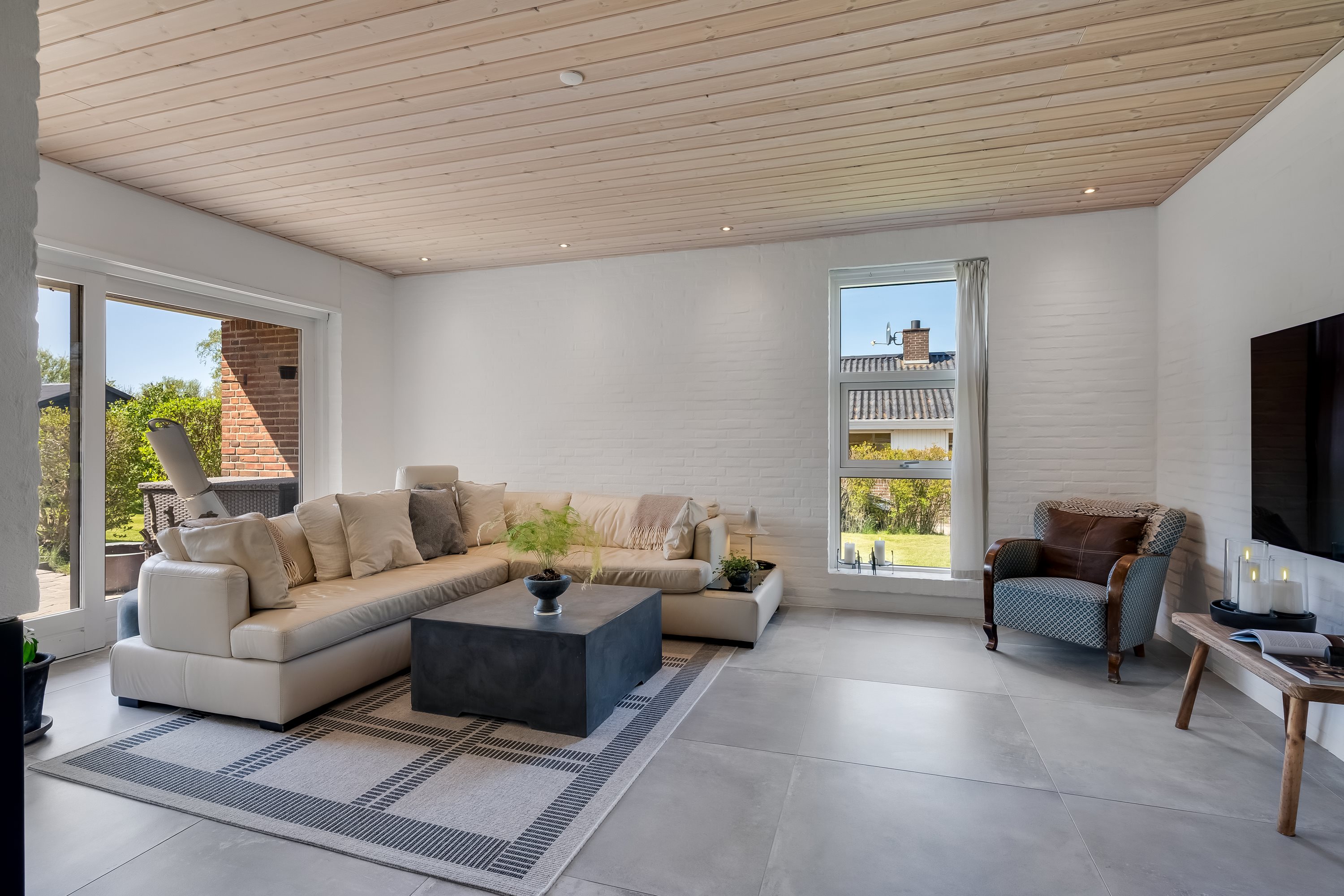 Fremhævet stue billede i fuldskærmstilstand. Billede af Ydunslund 28, 7620 Lemvig