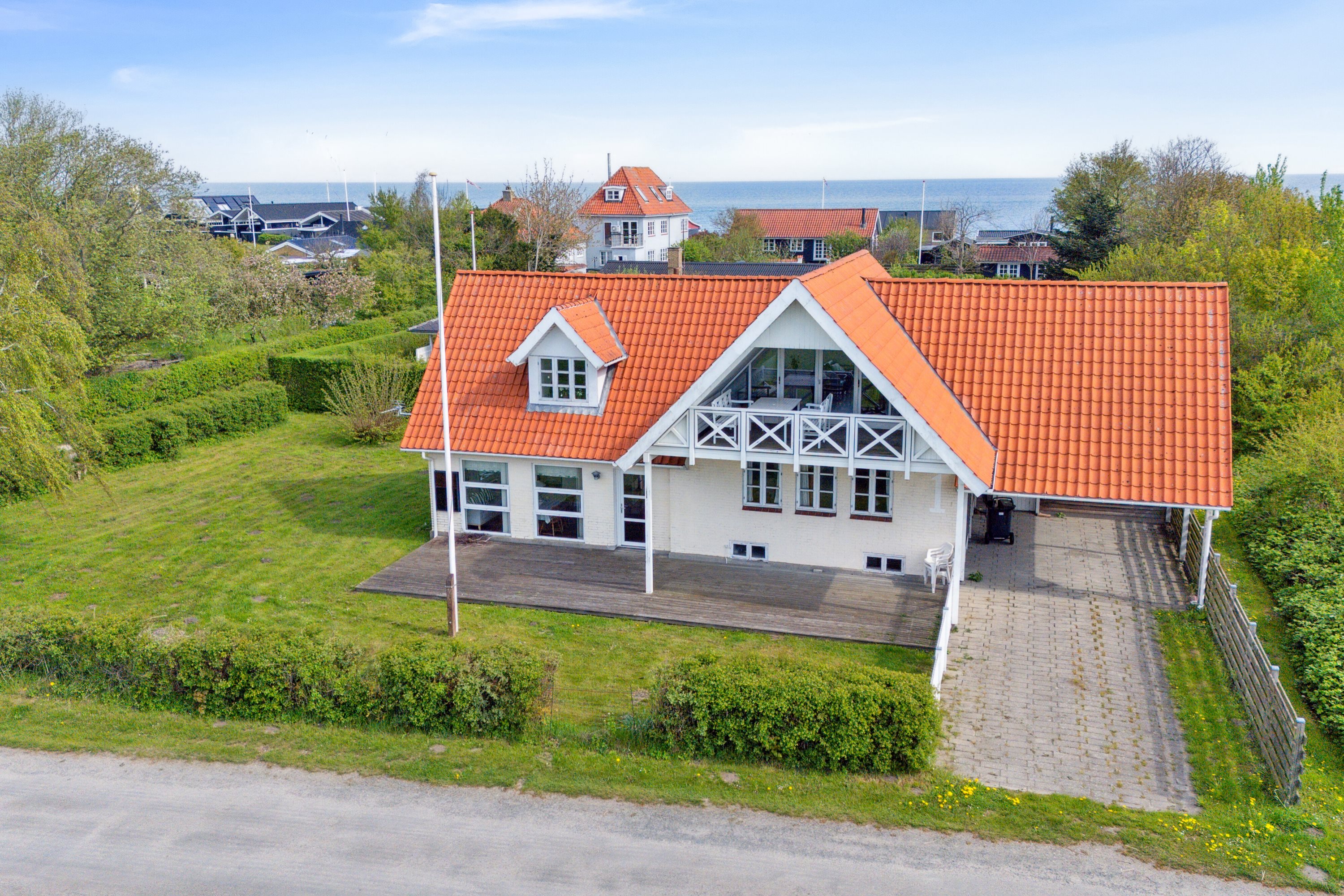 Fremhævet set fra haven billede i fuldskærmstilstand. Billede af Degnegyden 1, Kristiansminde, 5450 Otterup