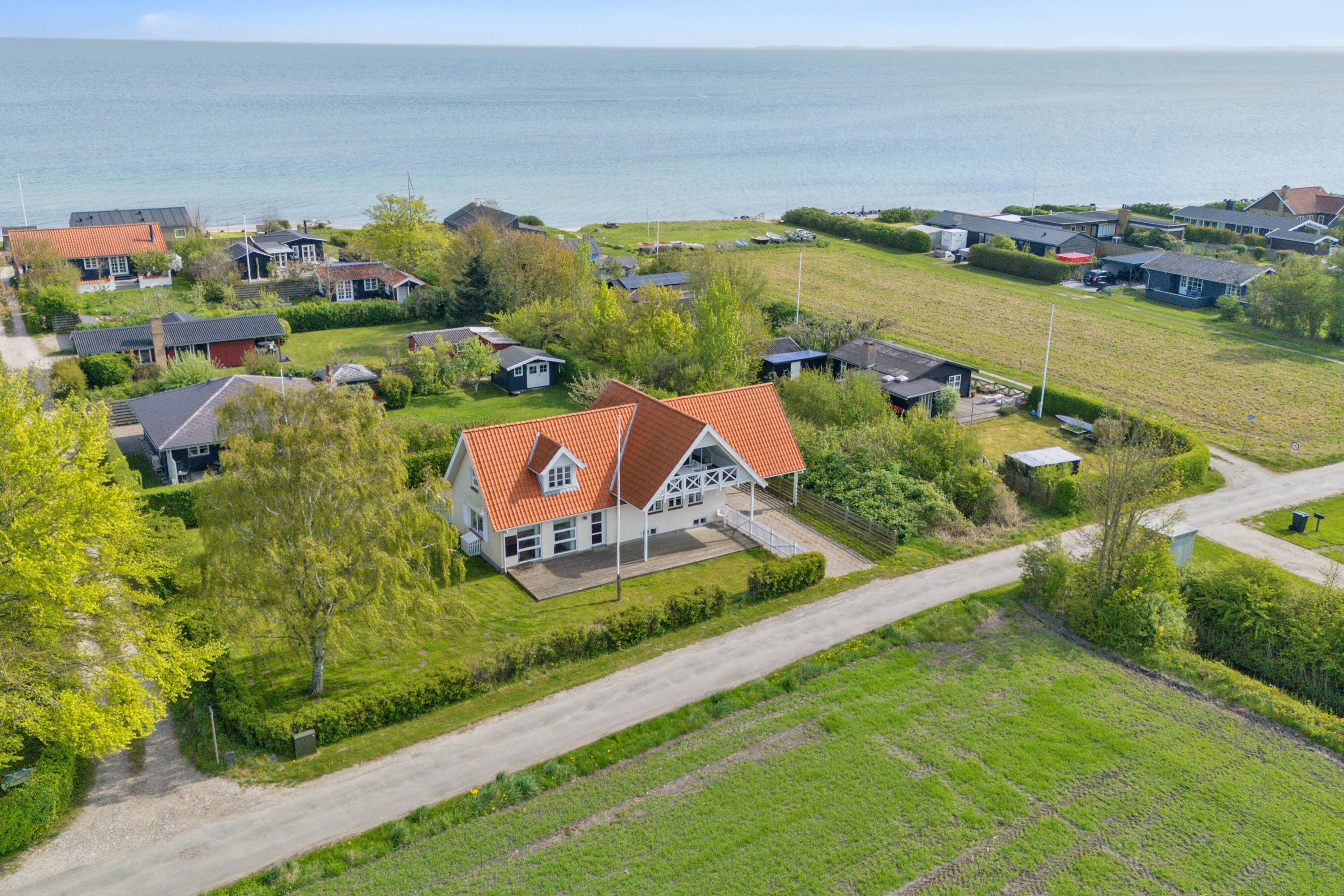 Fremhævet luftfoto billede i fuldskærmstilstand. Billede af Degnegyden 1, Kristiansminde, 5450 Otterup