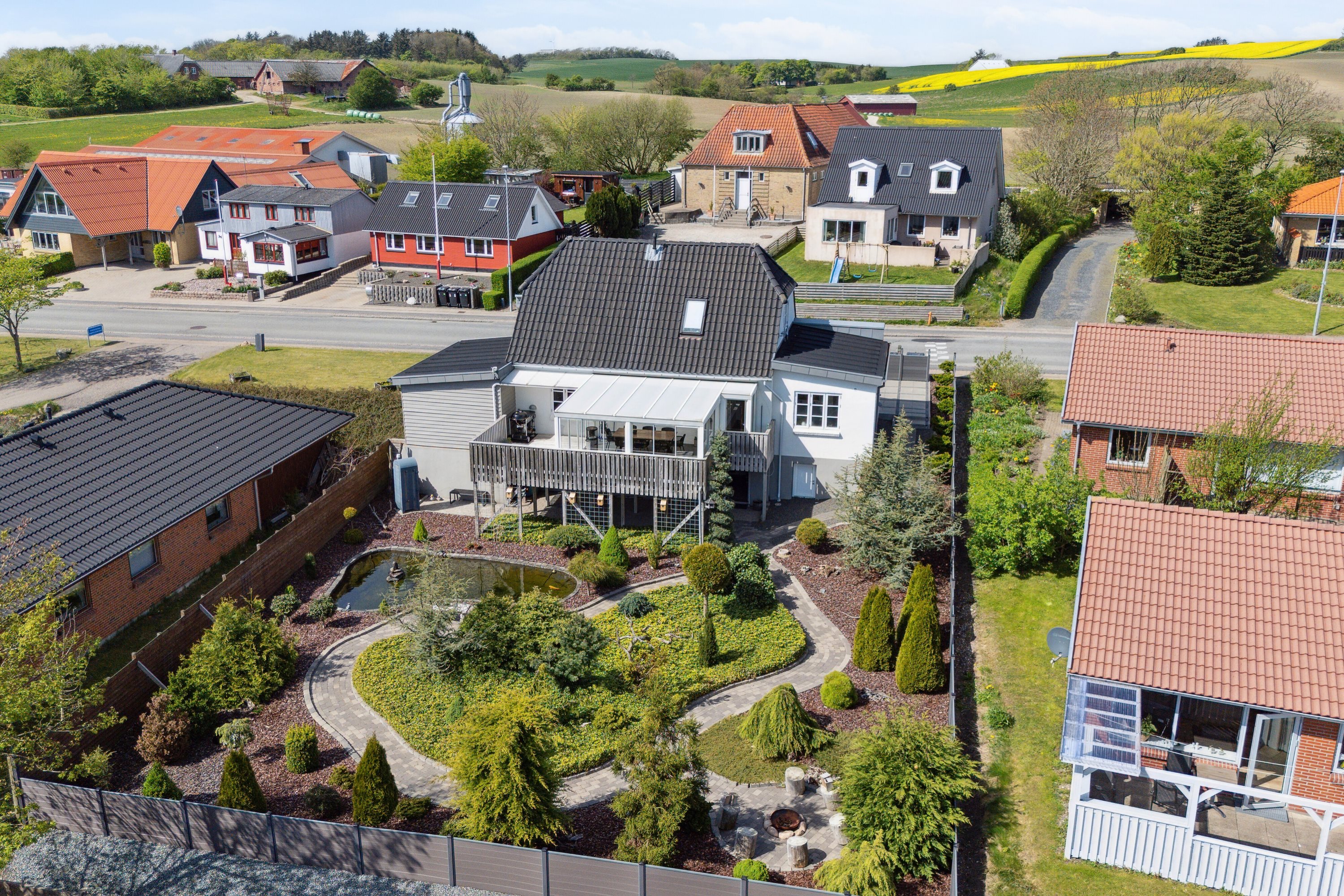 Fremhævet set fra haven billede i fuldskærmstilstand. Billede af Vorupørvej 143, Hundborg, 7700 Thisted