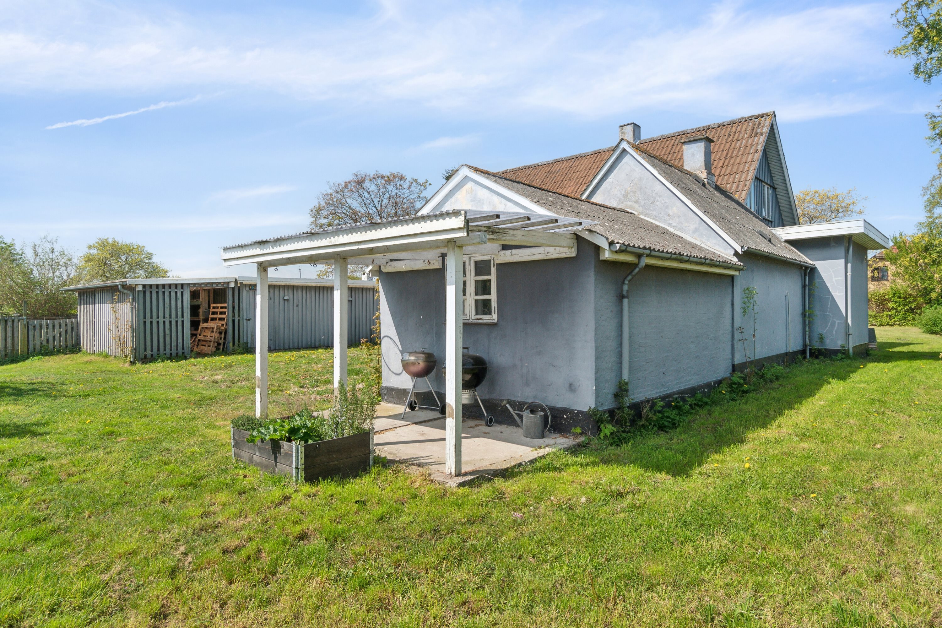 Fremhævet set fra haven billede i fuldskærmstilstand. Billede af Rørvigvej 86, 4500 Nykøbing Sj