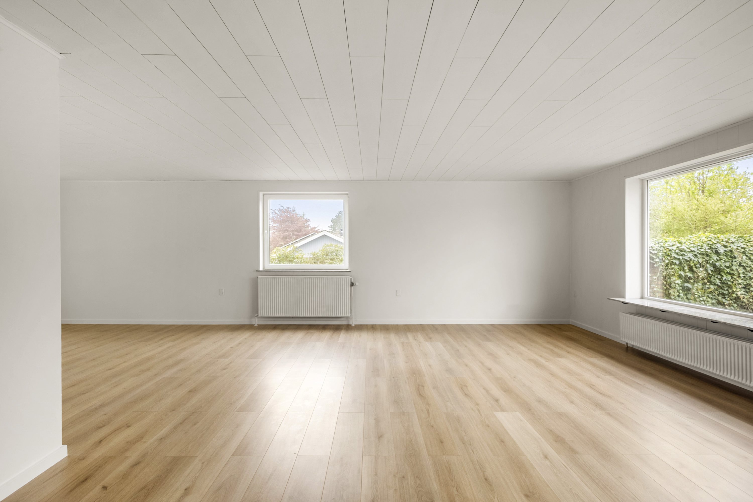 Fremhævet stue billede i fuldskærmstilstand. Billede af Ahlefeldtvej 17, Søgaard, 6200 Aabenraa