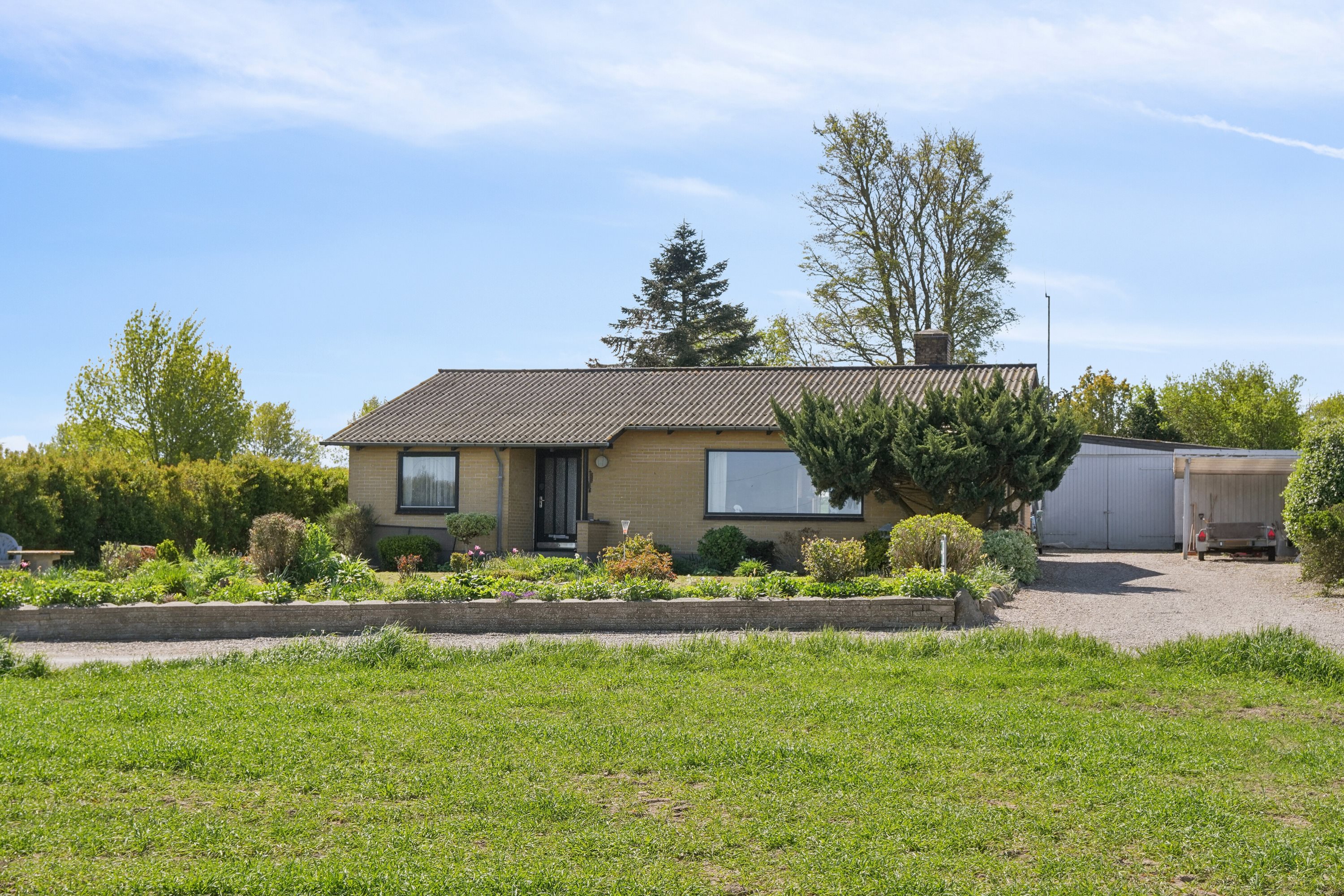 Fremhævet set fra haven billede i fuldskærmstilstand. Billede af Halevejen 17, Ristinge, 5932 Humble