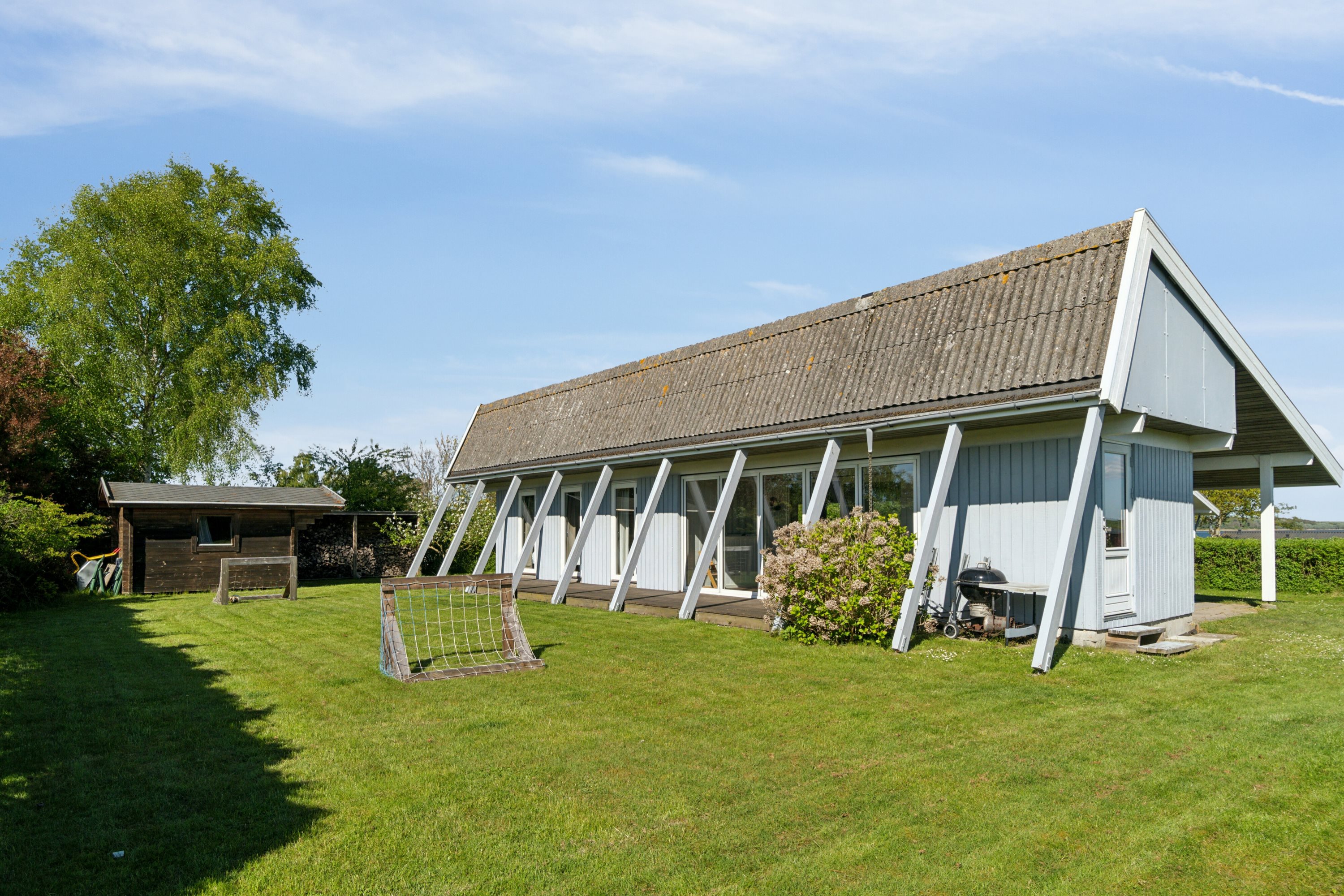 Fremhævet set fra haven billede i fuldskærmstilstand. Billede af Strandagervej 12, Enø, 4736 Karrebæksminde