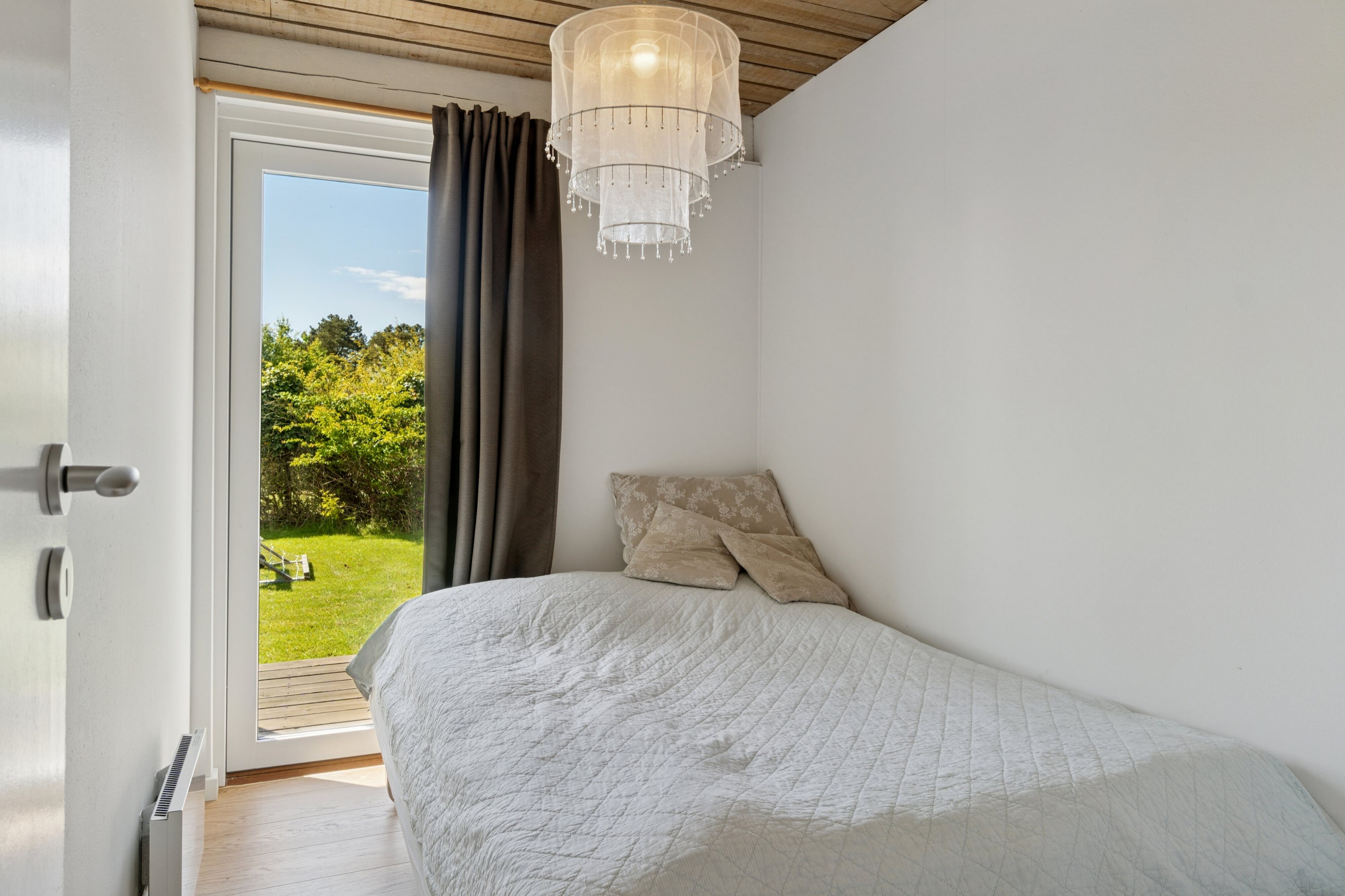 Fremhævet soveværelse billede i fuldskærmstilstand. Billede af Strandagervej 12, Enø, 4736 Karrebæksminde