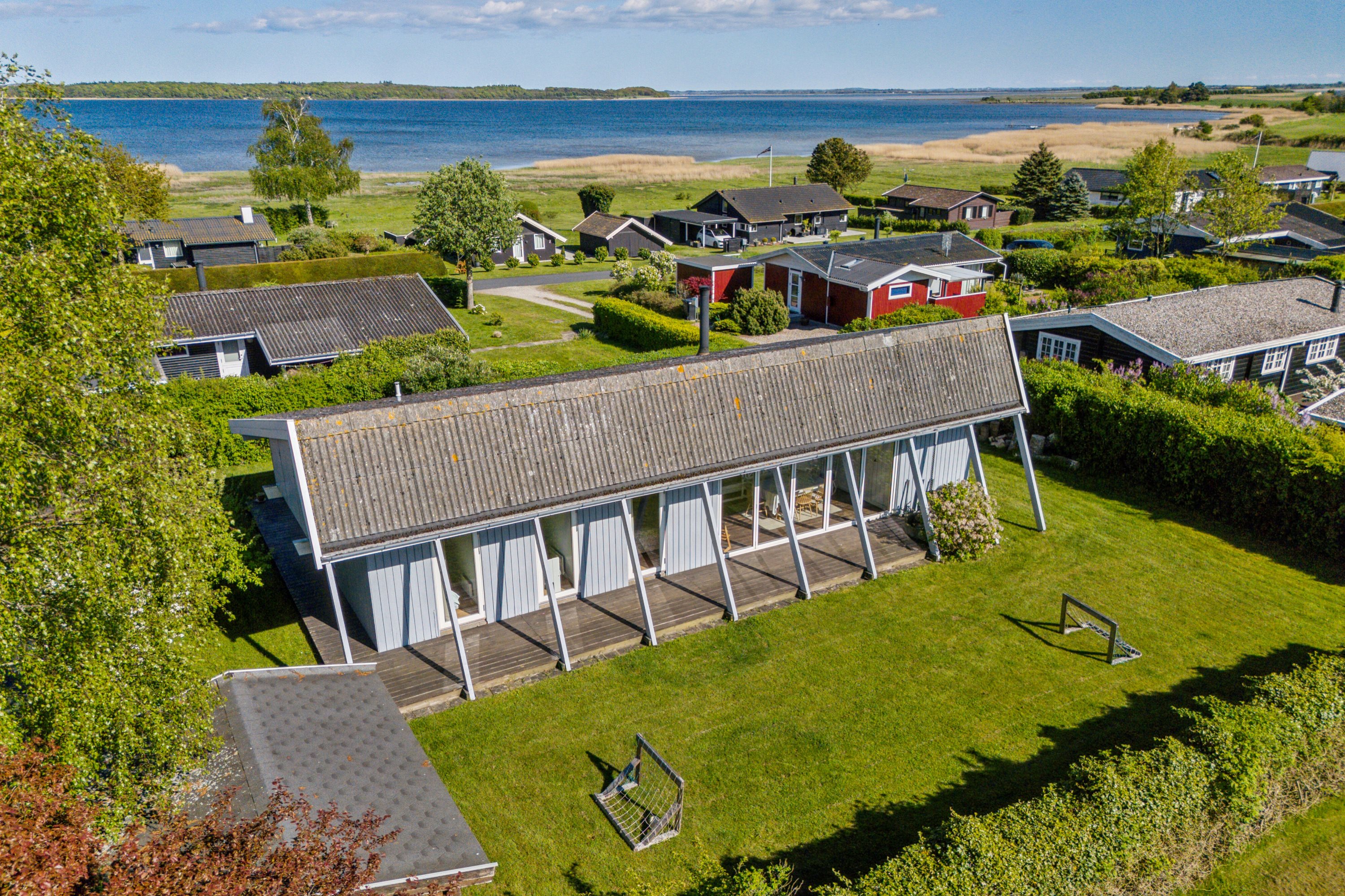 Fremhævet luftfoto billede i fuldskærmstilstand. Billede af Strandagervej 12, Enø, 4736 Karrebæksminde