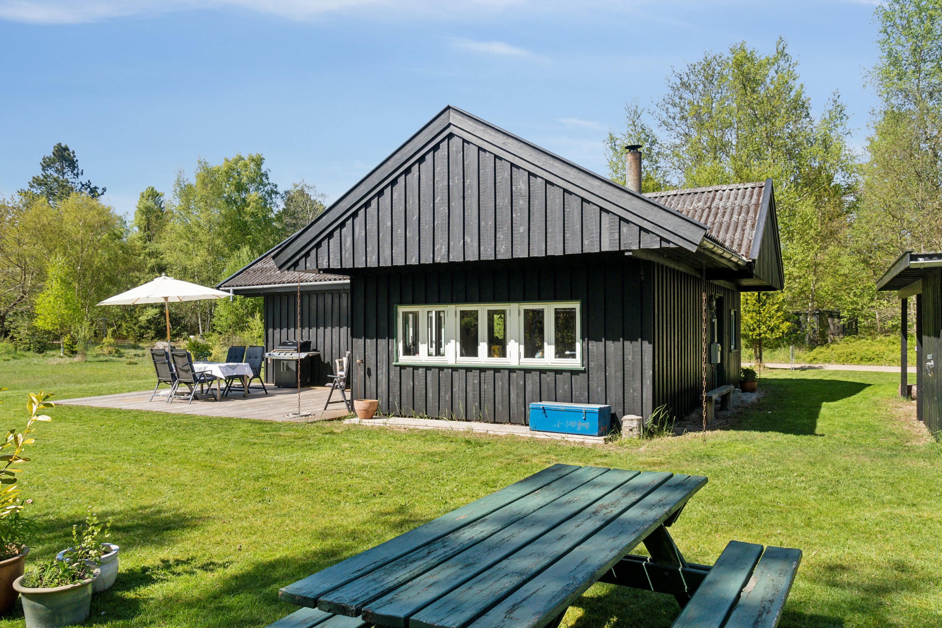 Fremhævet set fra haven billede i fuldskærmstilstand. Billede af Lisbeths Vænge 3, Tibirke Sand, 3300 Frederiksværk