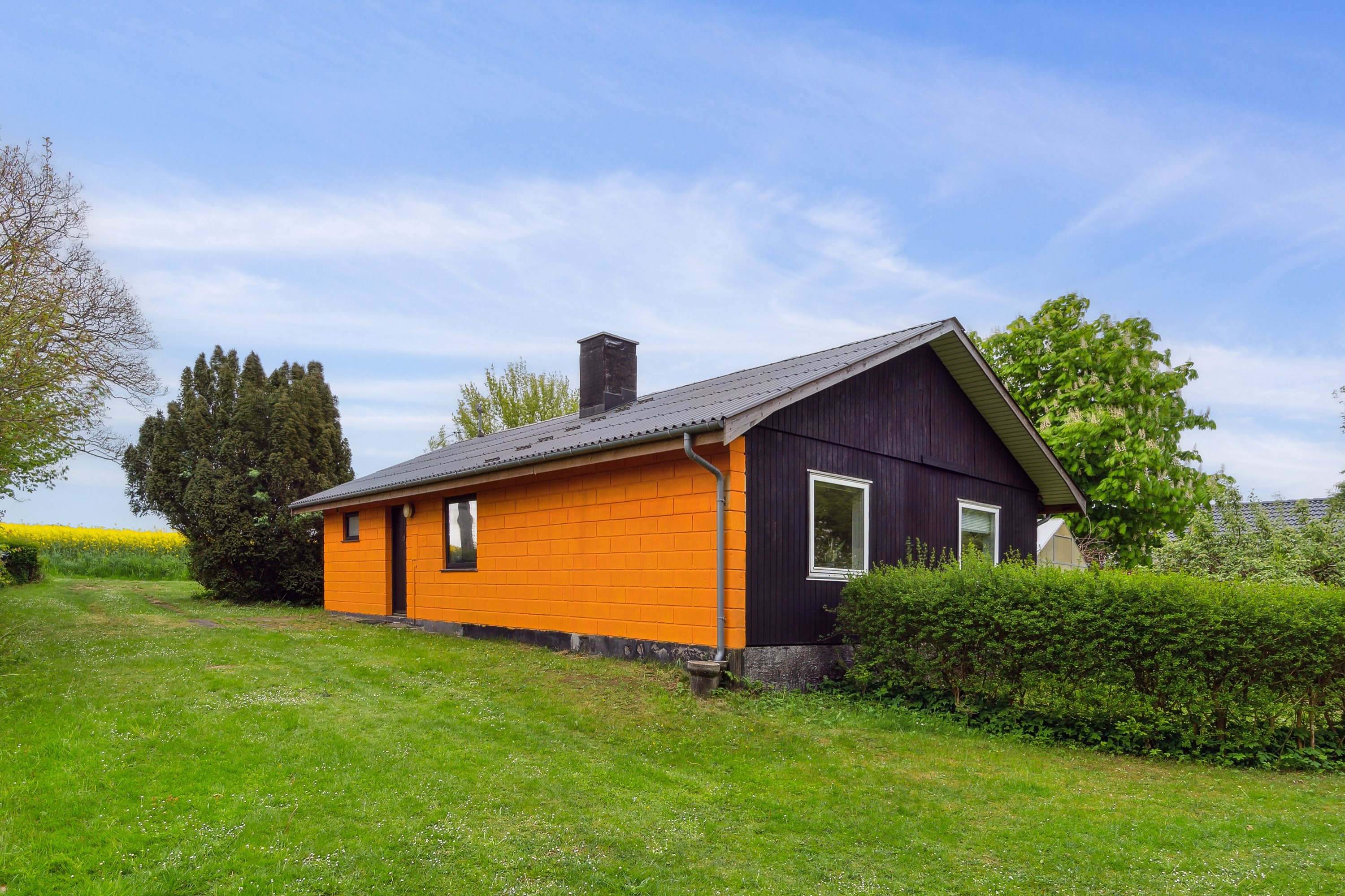 Fremhævet set fra haven billede i fuldskærmstilstand. Billede af Svinøvestervej 7, 4750 Lundby