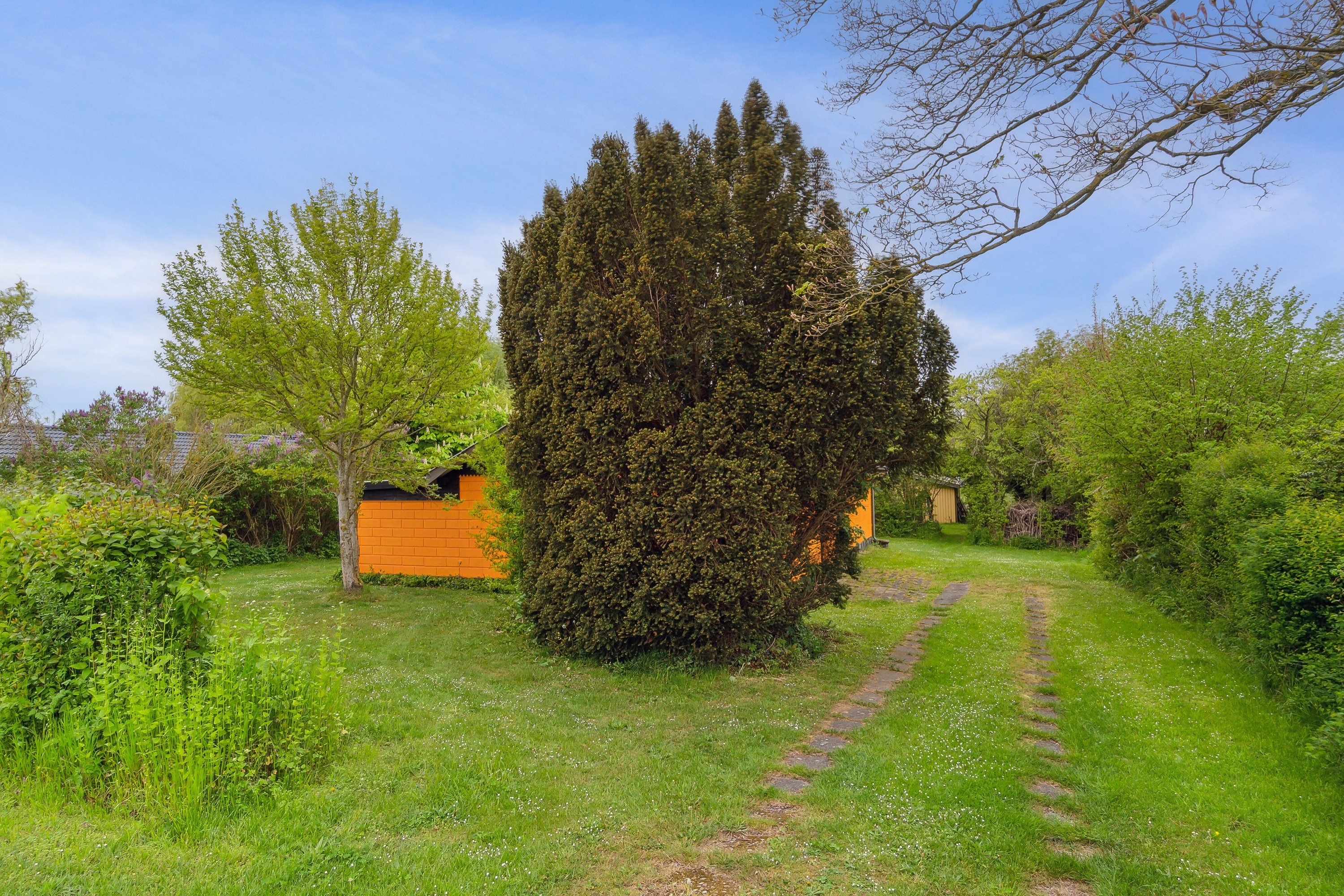 Fremhævet set fra haven billede i fuldskærmstilstand. Billede af Svinøvestervej 7, 4750 Lundby