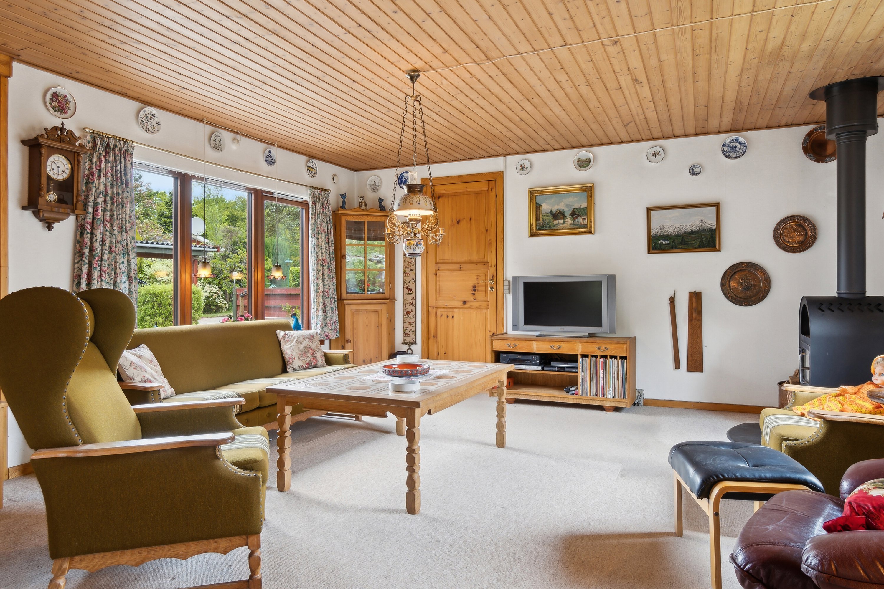 Fremhævet stue billede i fuldskærmstilstand. Billede af Olaf Poulsensvej 5, Evetofte, 3370 Melby