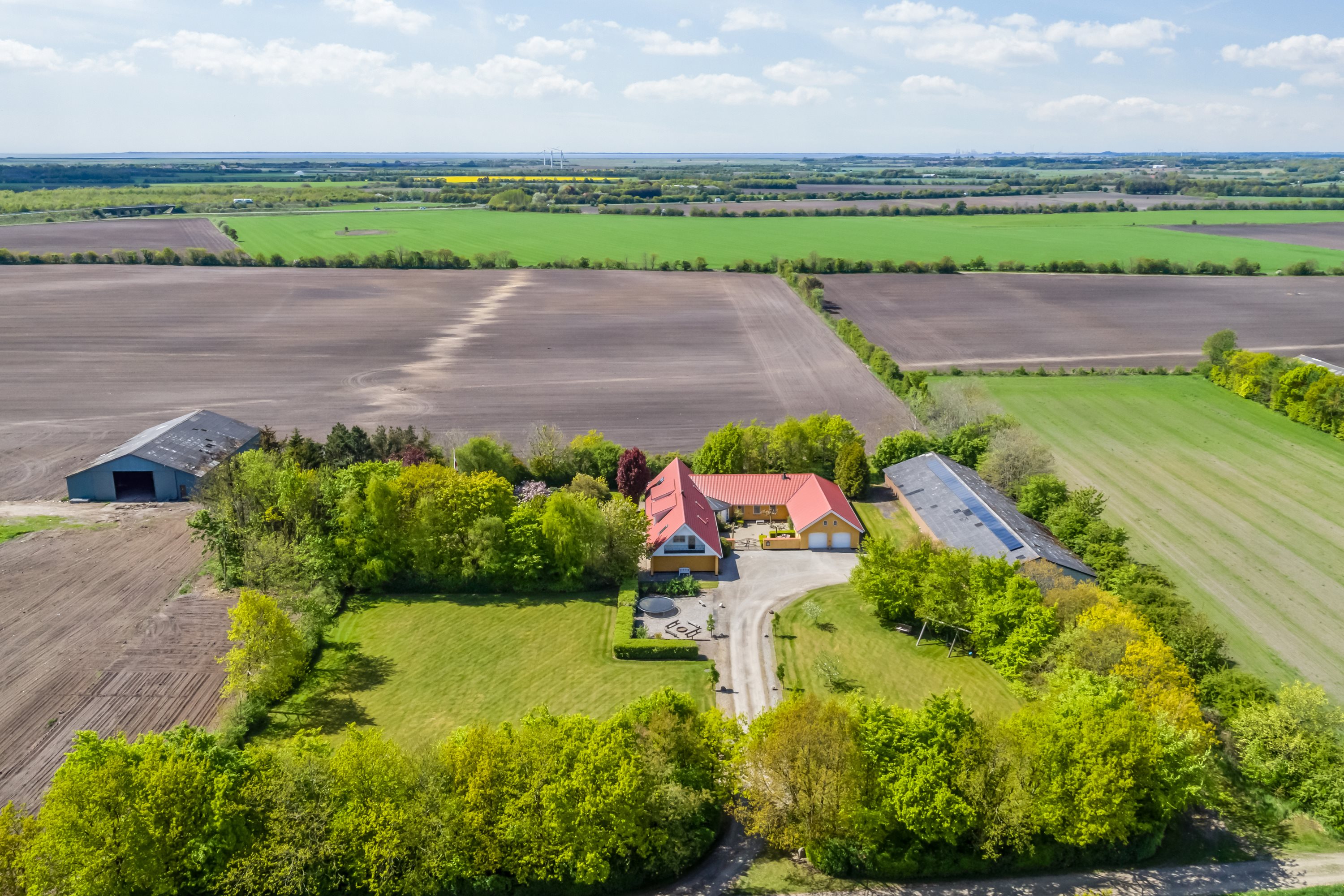 Fremhævet luftfoto billede i fuldskærmstilstand. Billede af Ulkjærvej 63, 6771 Gredstedbro