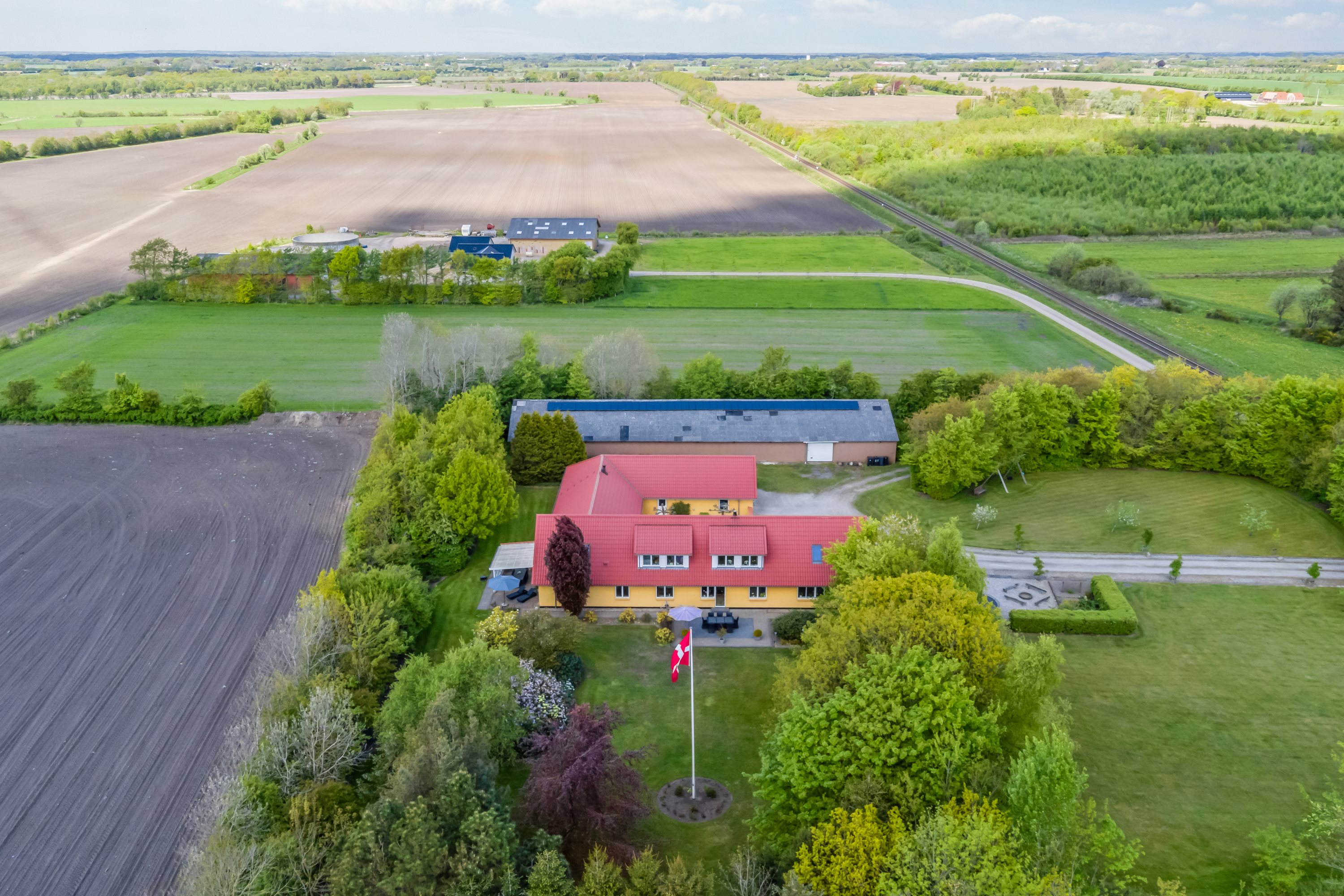 Fremhævet luftfoto billede i fuldskærmstilstand. Billede af Ulkjærvej 63, 6771 Gredstedbro
