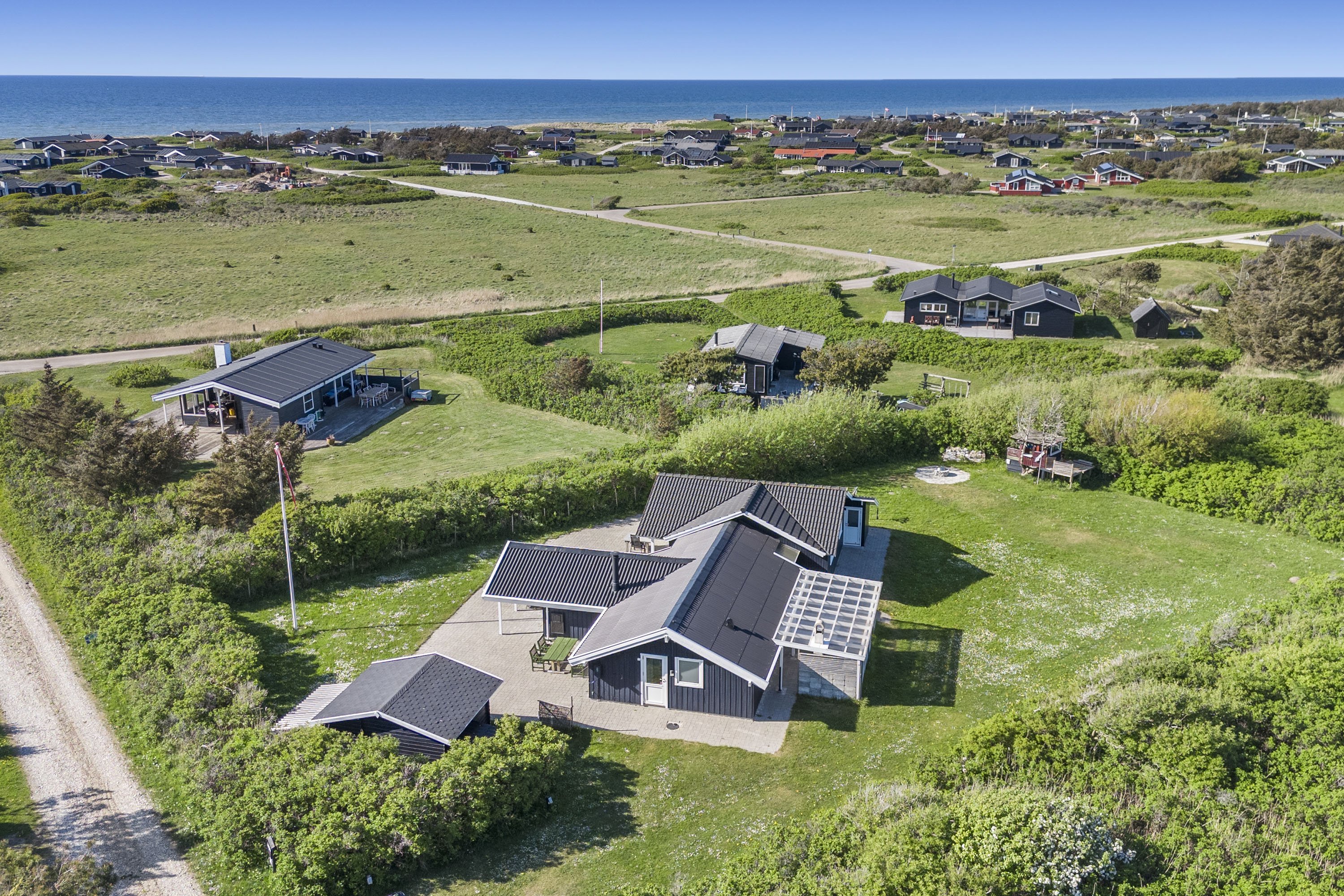 Fremhævet luftfoto billede i fuldskærmstilstand. Billede af Martsvej 39, Skal Klit, 9800 Hjørring