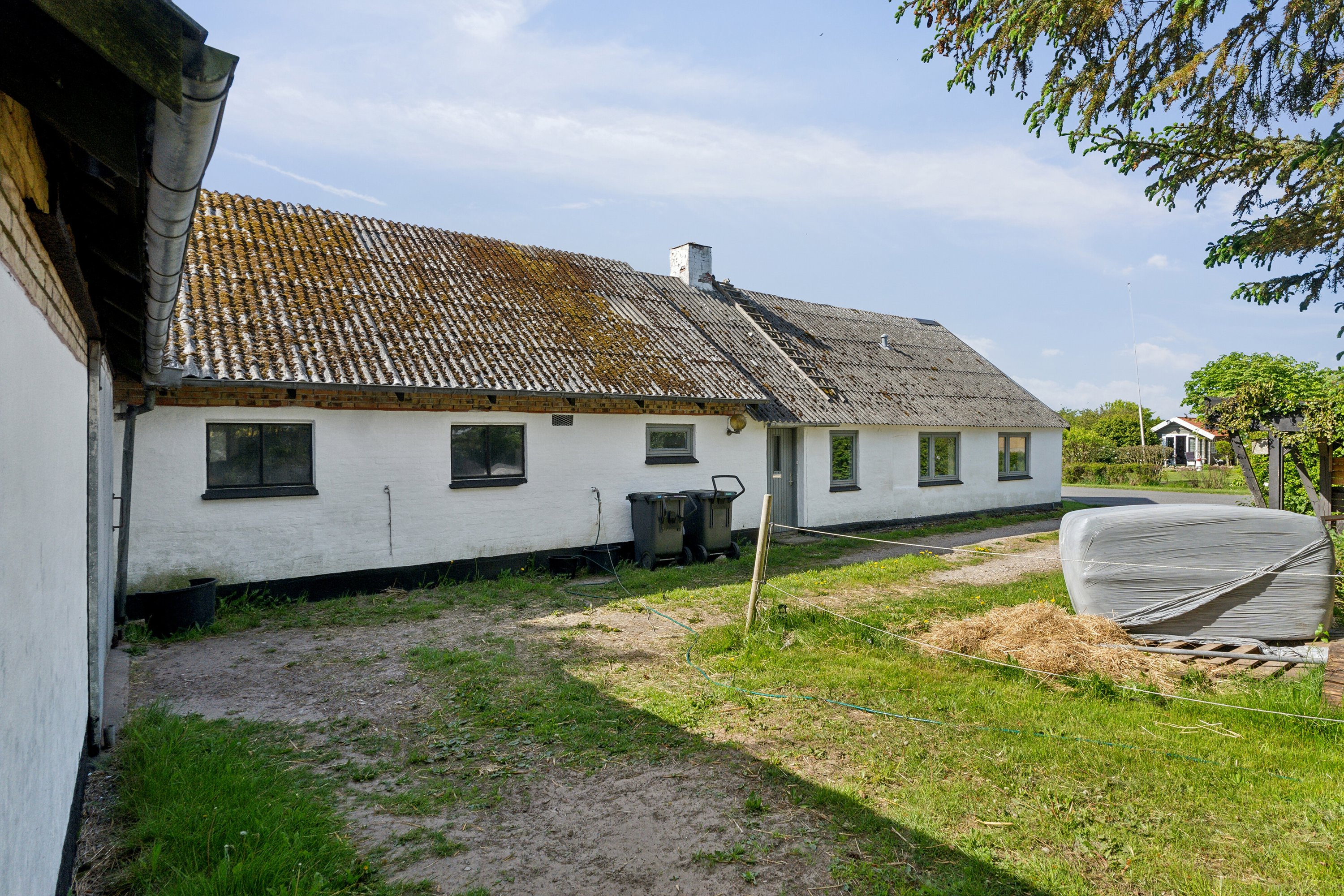 Fremhævet set fra haven billede i fuldskærmstilstand. Billede af Allingdamvej 149, Bjergby, 9800 Hjørring