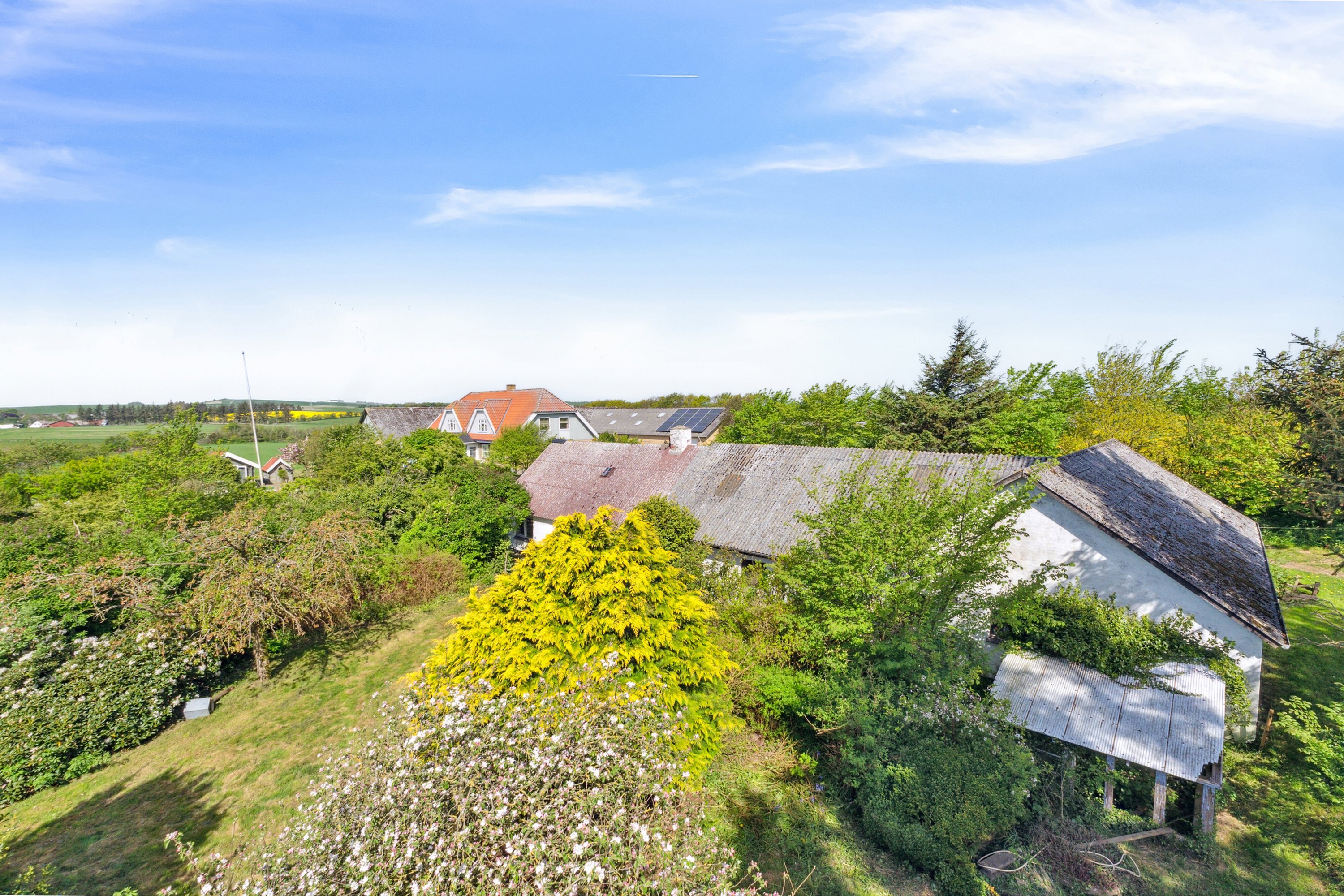 Fremhævet set fra haven billede i fuldskærmstilstand. Billede af Allingdamvej 149, Bjergby, 9800 Hjørring