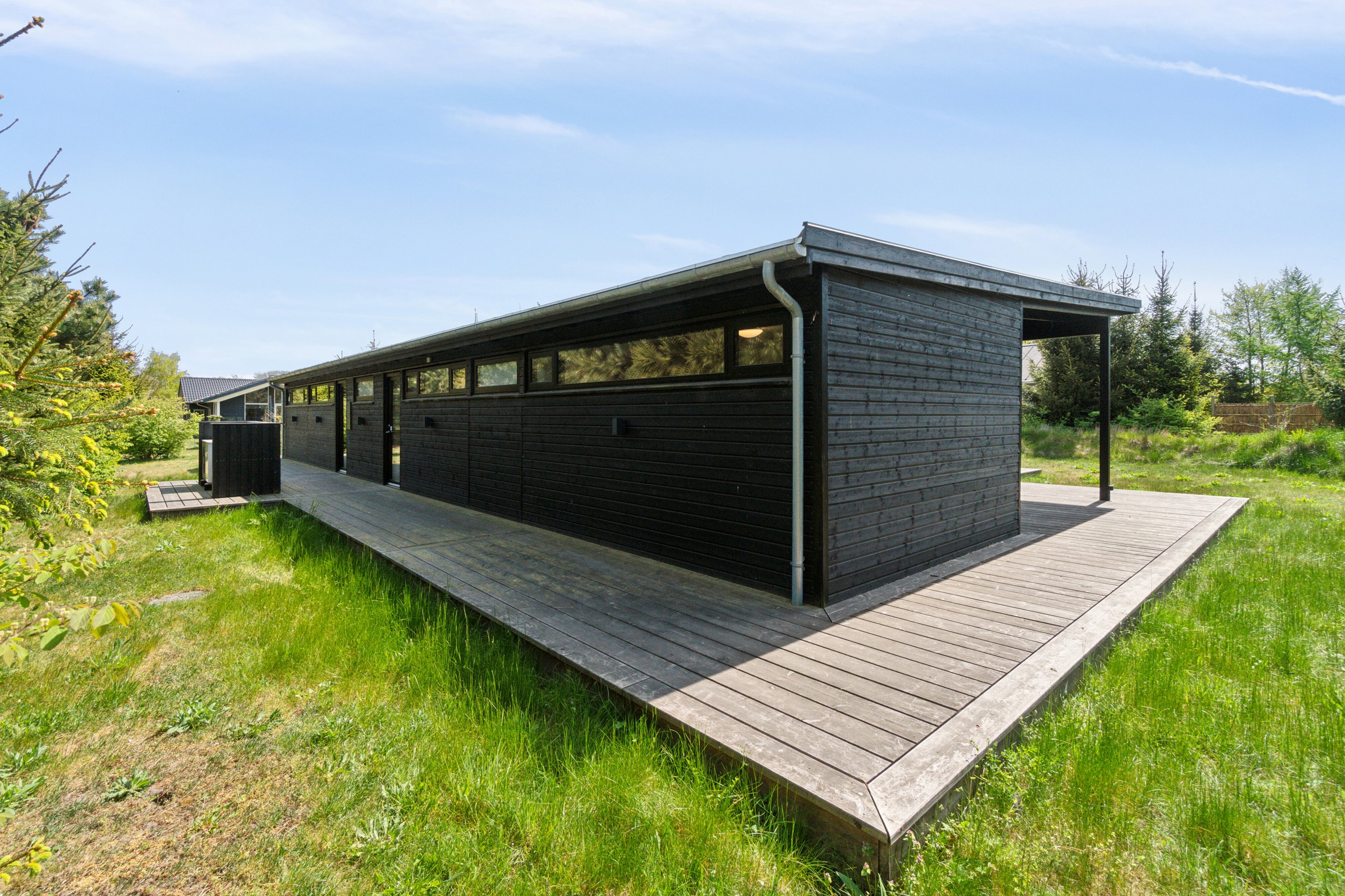 Fremhævet set fra haven billede i fuldskærmstilstand. Billede af Åbrinken 2, Pedersker, 3720 Aakirkeby