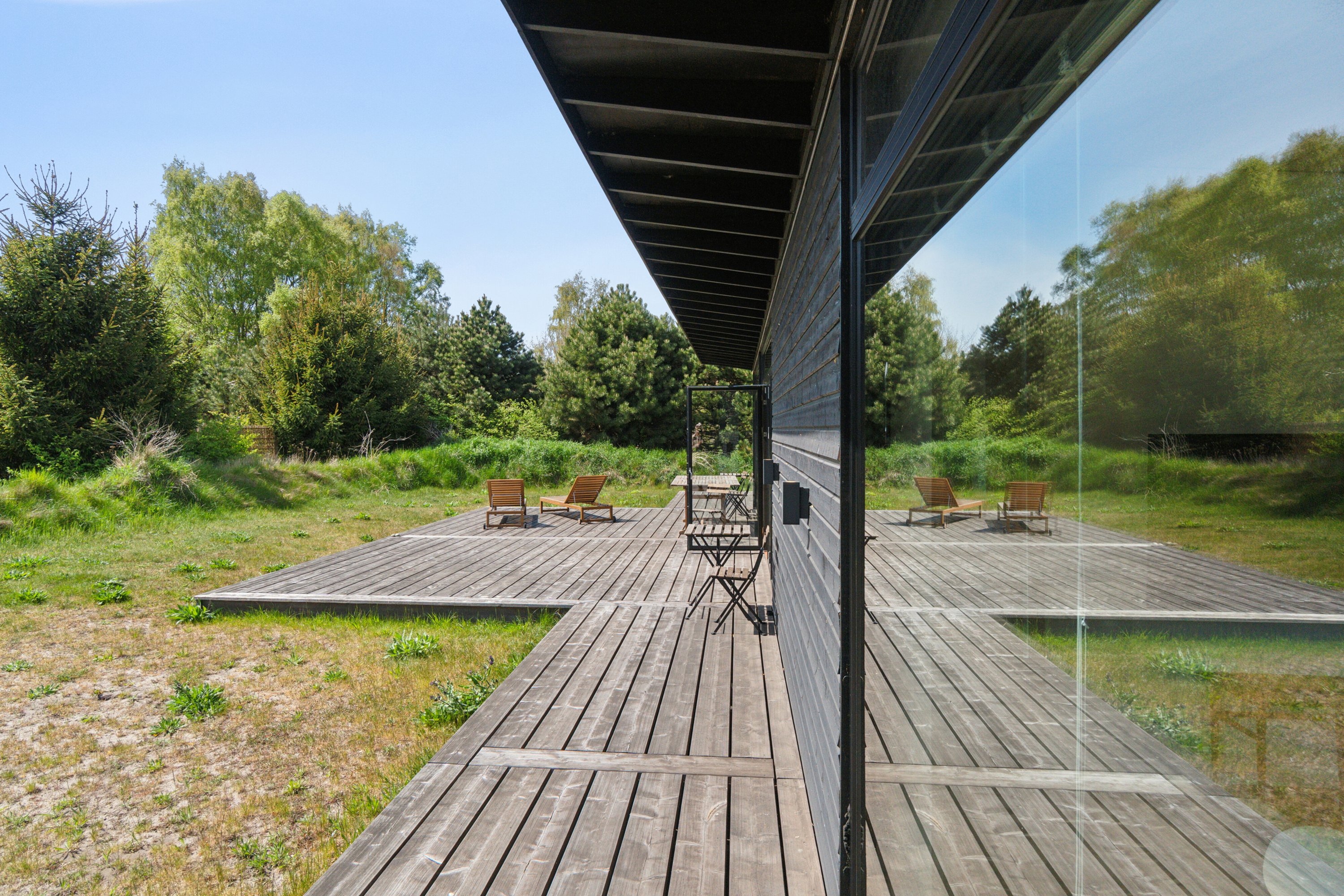 Fremhævet set fra vejen billede i fuldskærmstilstand. Billede af Åbrinken 2, Pedersker, 3720 Aakirkeby