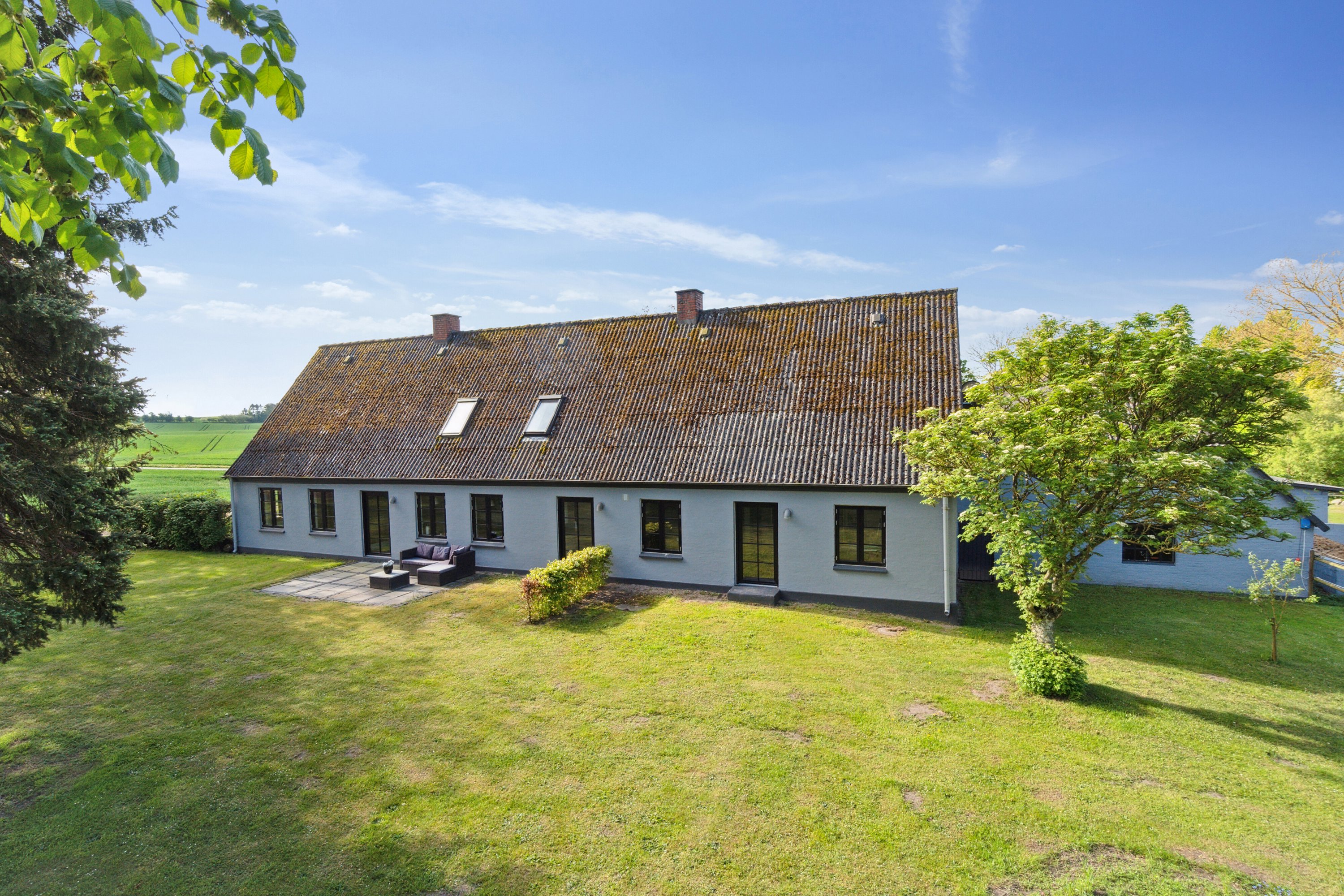 Fremhævet set fra haven billede i fuldskærmstilstand. Billede af Nyrupvej 23, Nyrup, 4350 Ugerløse