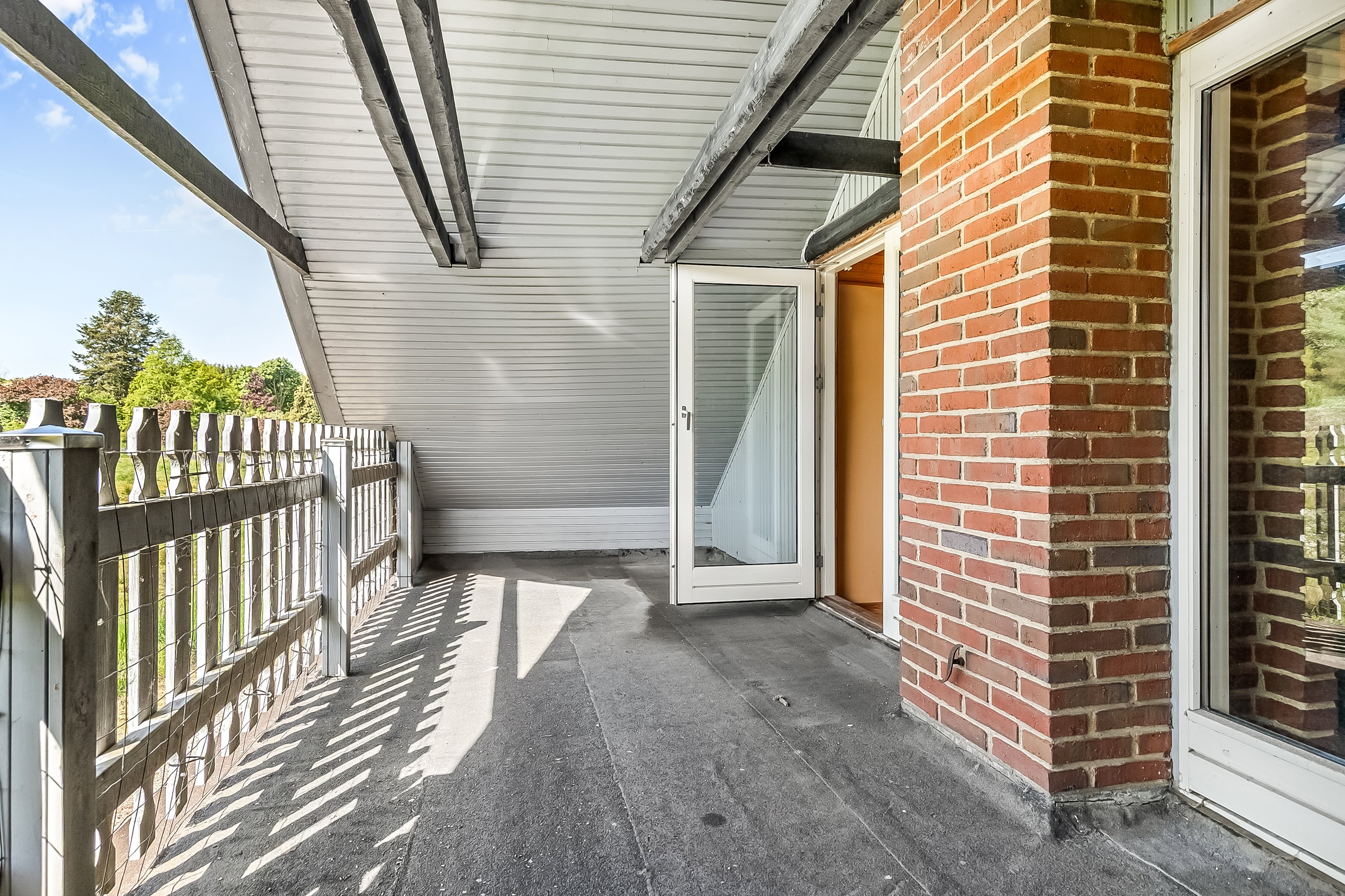 Fremhævet altan billede i fuldskærmstilstand. Billede af Ejstrupvej 25, Vranderup, 6000 Kolding