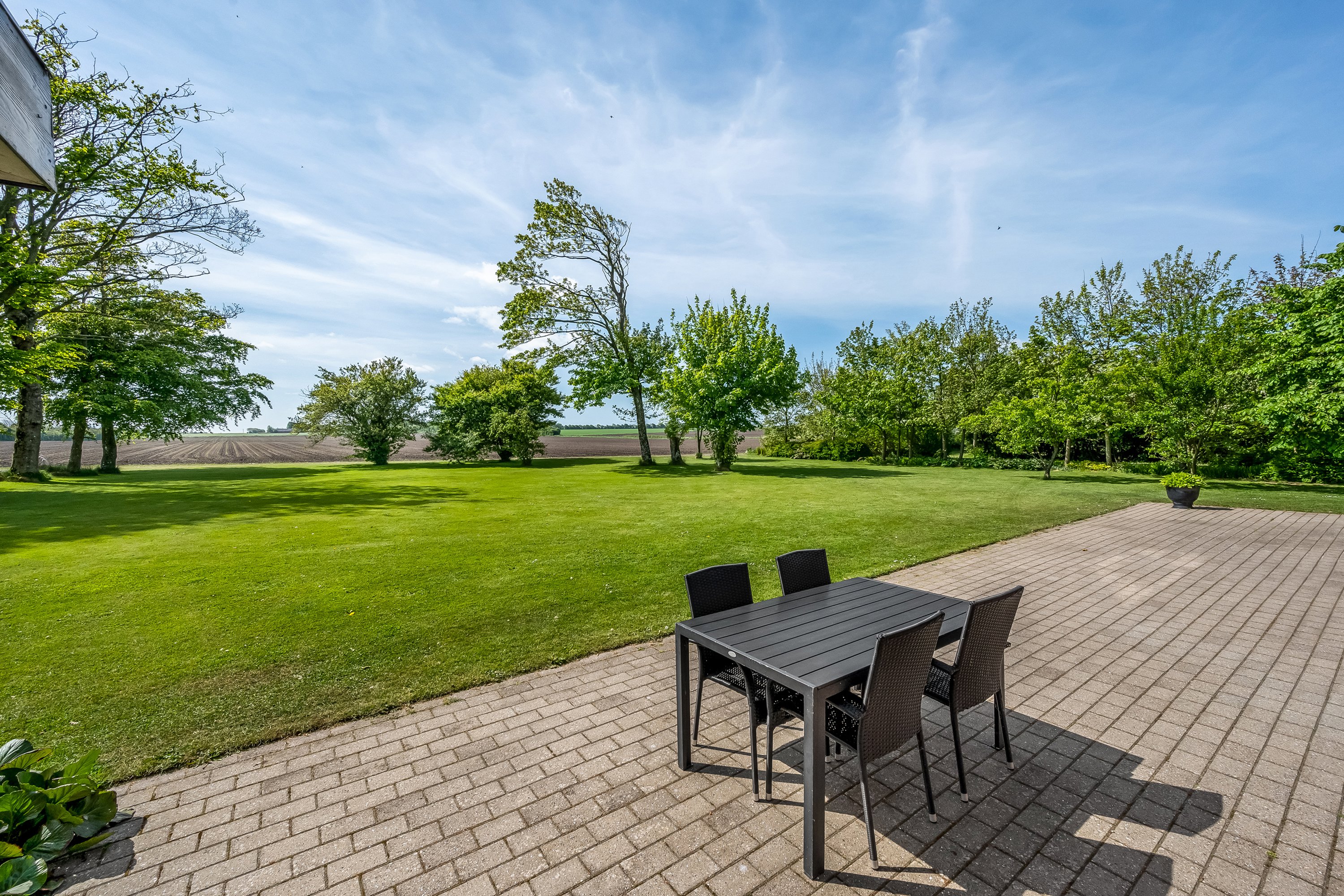 Fremhævet terrasse billede i fuldskærmstilstand. Billede af Kærhusvej 19, Vanting, 6971 Spjald