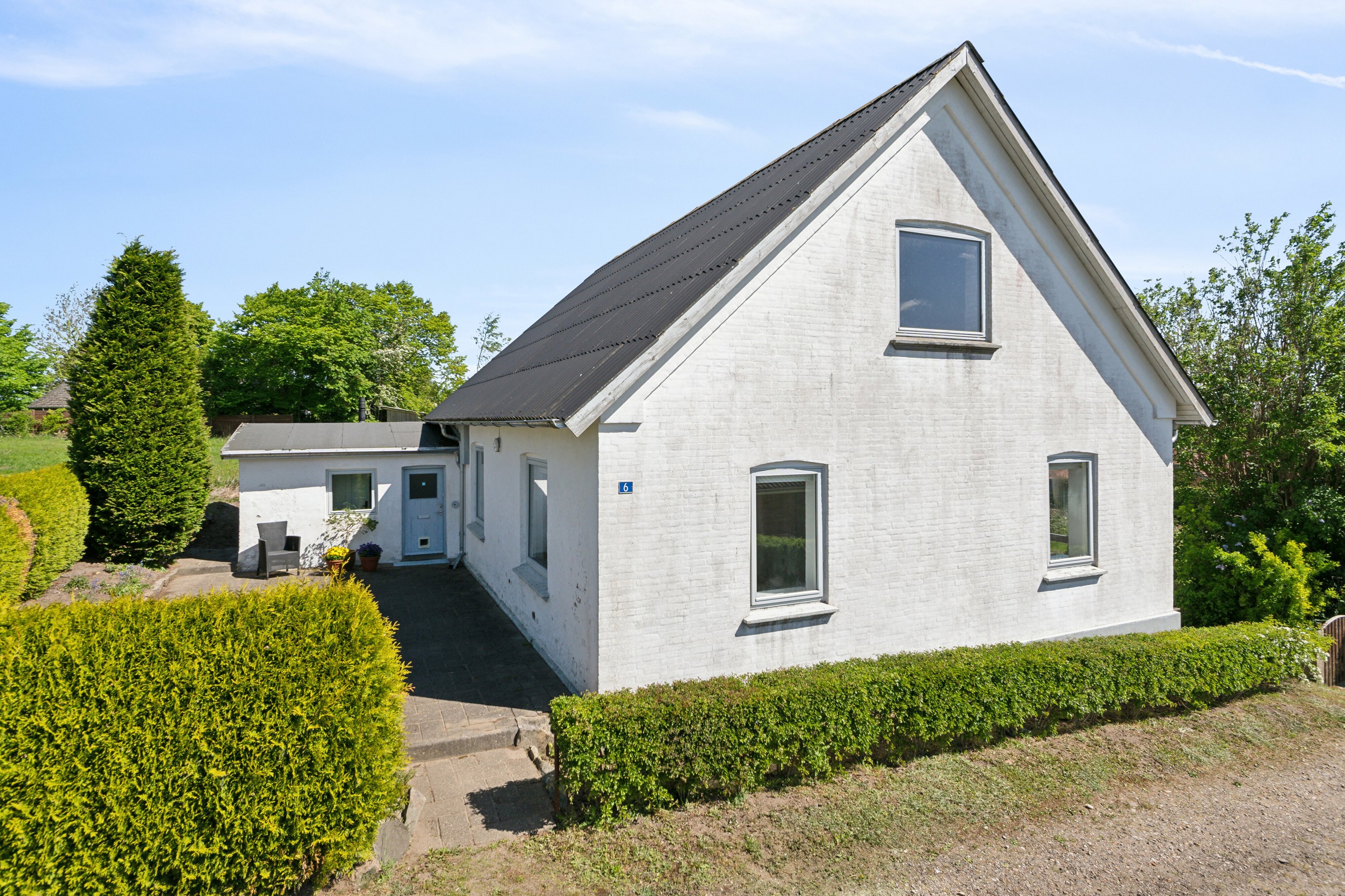 Fremhævet set fra haven billede i fuldskærmstilstand. Billede af Ahornvej 6, Salten, 8653 Them